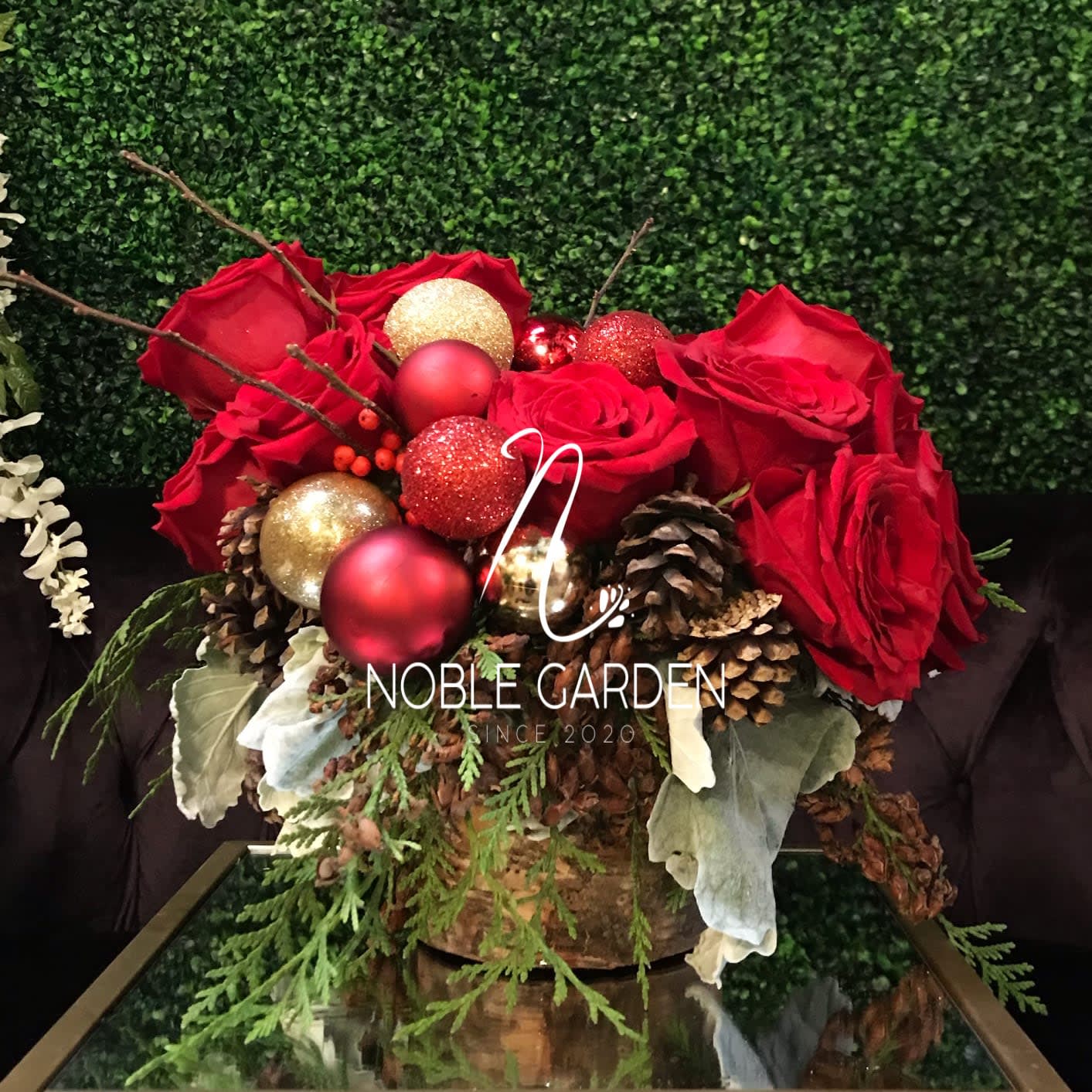Elegant holiday - modern arrangement.  The premium size will get an upgrade to an elegant bigger vase.