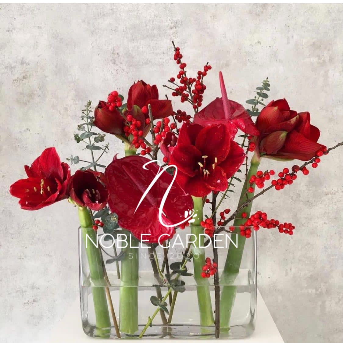 Holidays 2020 - Red and modern arrangement.  The premium size will get an upgrade to an elegant glass vase.