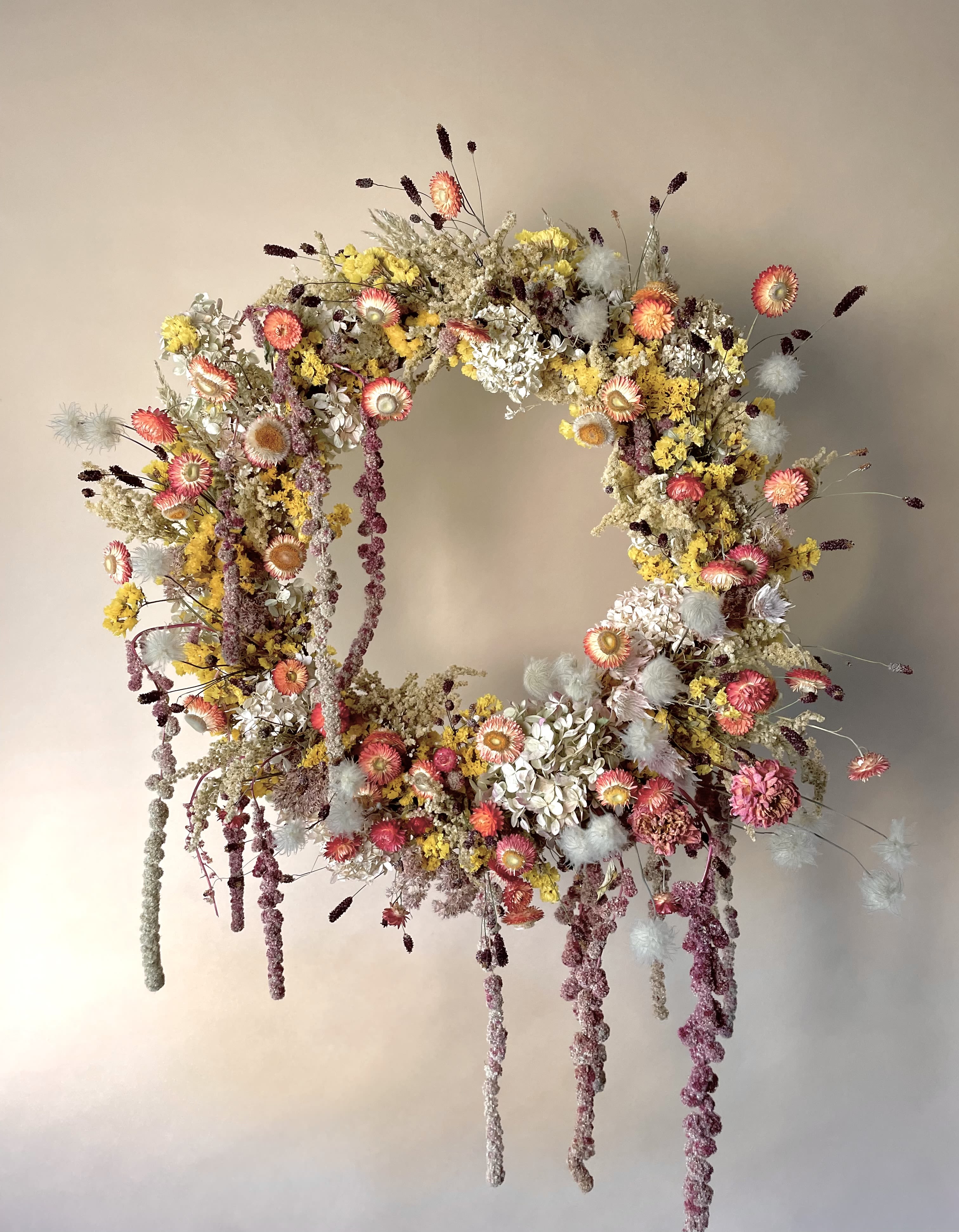 Large Autumn Wreath - This beautiful wreath is fully dried and artfully crafted in store by our designers. This listing is distinctive in that what you see is what you get! Each dried wall adornment we make is unique and created with the season in mind. If you choose to send this listing to a loved one or pick it up yourself, you will be purchasing the exact item pictured.  This wreath measures approximately 26-36&quot; across in diameter. Any variance is due to the extension of materials.  *A note about dried materials: The dried materials crafted in the store will, for all intents and purposes, last forever if properly taken care of. Mainly this means shielding them from direct sunlight and excess moisture. When not in use, store your dried materials in a safe and somewhat dark space*