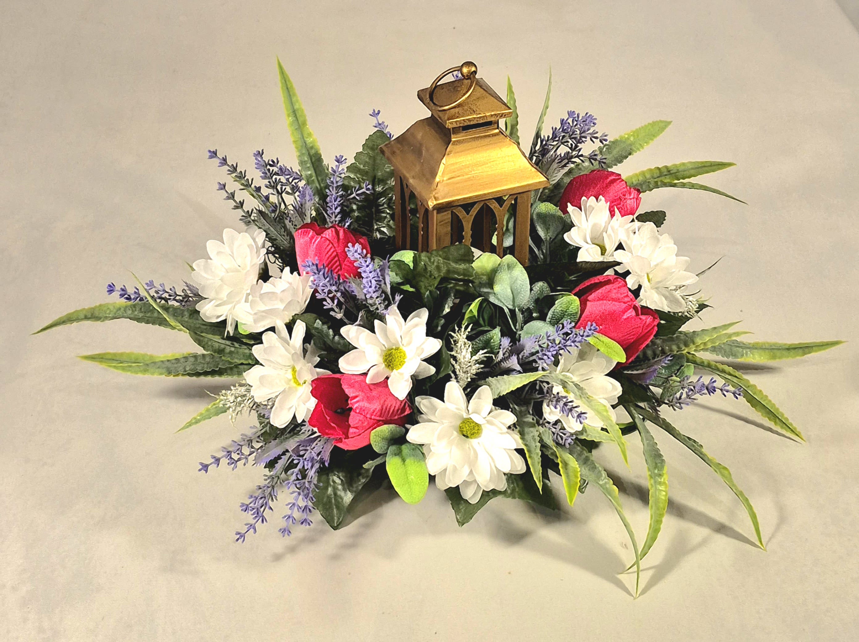 Lighted Silk Pink, White and Purple Centerpiece - Elegant small tealight lantern (batteries included) silk arrangement is handcrafted with pink, white and lavender silk flowers, and mixture of flocked greens.  12&quot; T 12&quot; W 