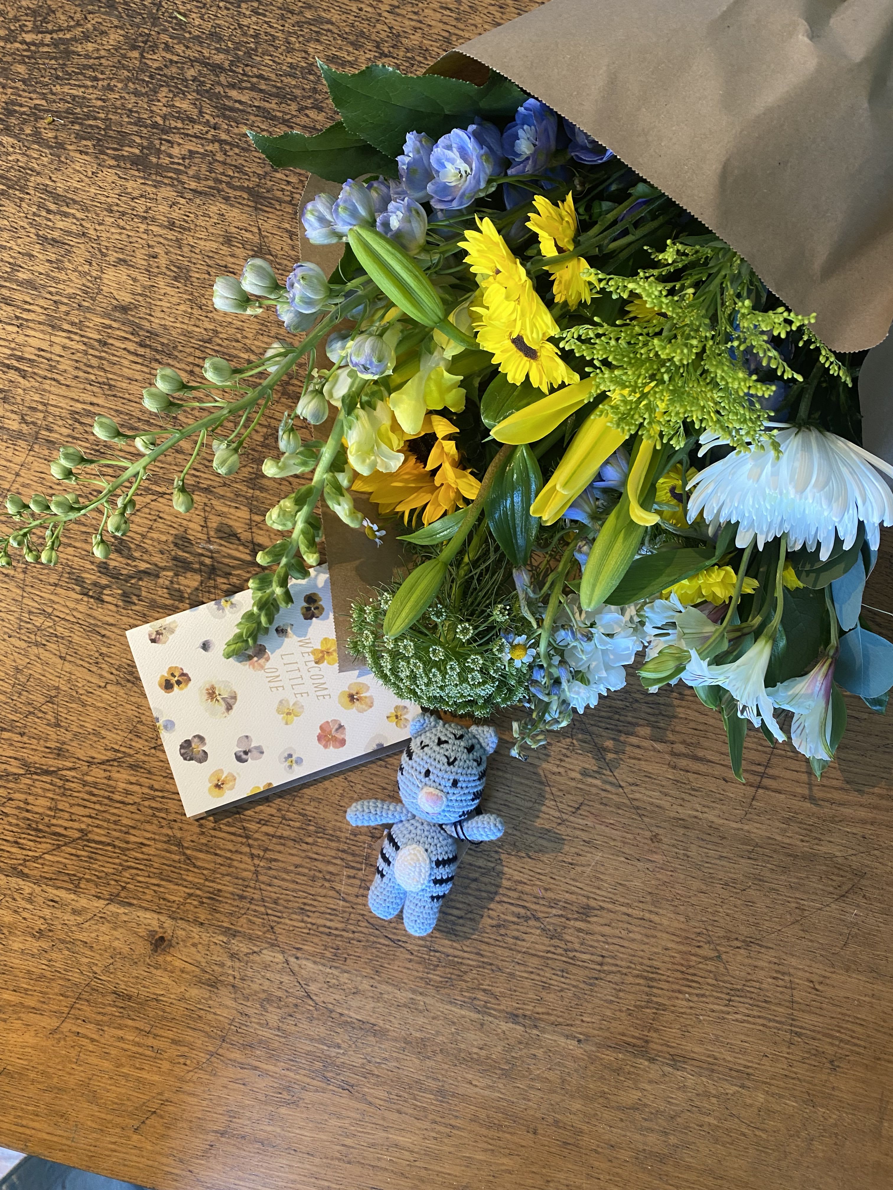 Baby boy Bundle  - Congratulate the new parents! With this  new baby boy bundle. That includes a Standard size bouquet, greeting card, and a 4.5-inch tall miniature crochet toy made of 100% cotton. (Please note: crochet toy might be substituted if blue cat not available)