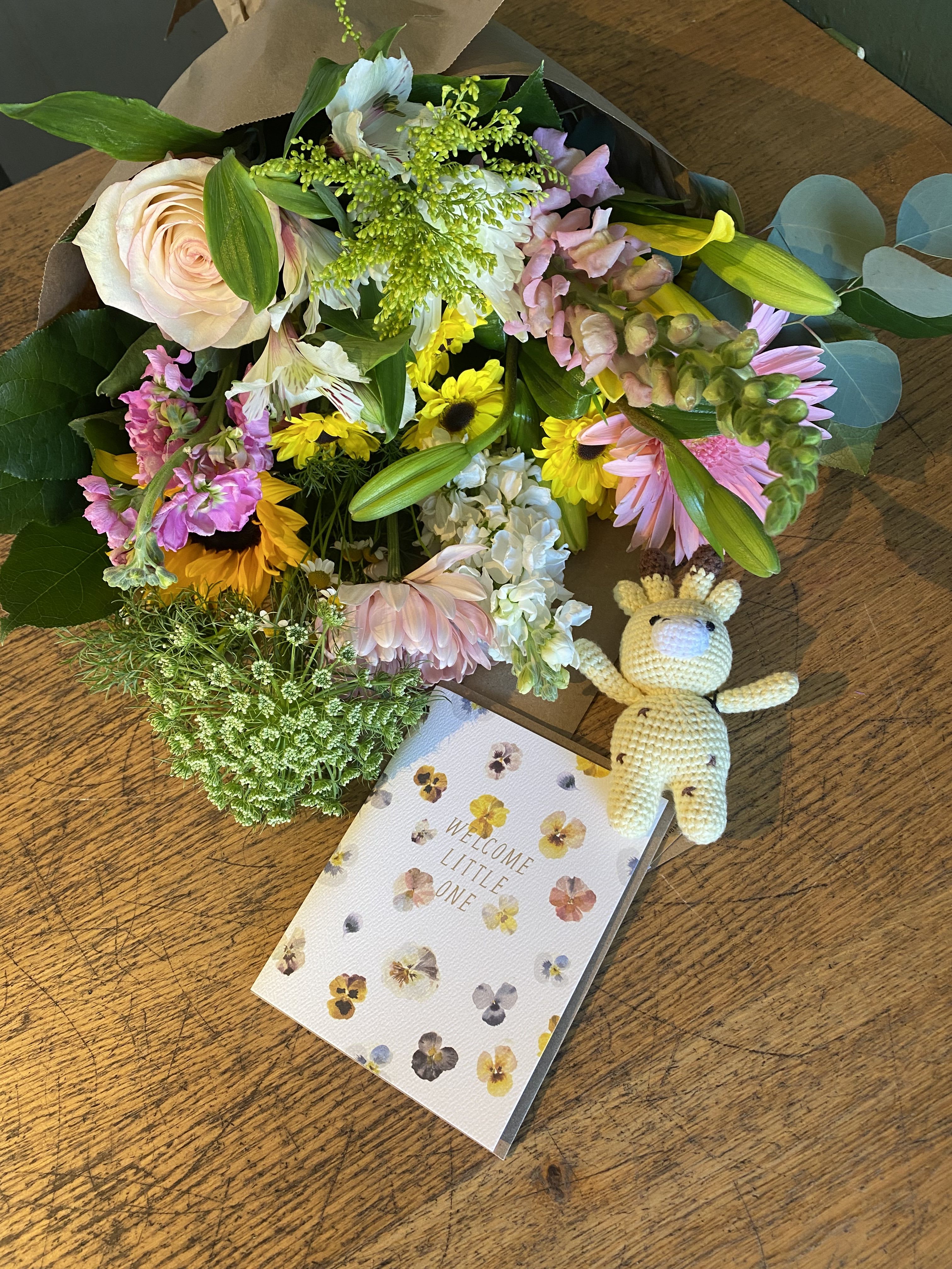 Baby girl bundle  - Congratulate the new parents! With this new baby girl bundle. That includes a Standard size bouquet, greeting card, and a 4.5-inch tall miniature crochet toy made of 100% cotton. (Please note: crochet toy might be substituted if not available)