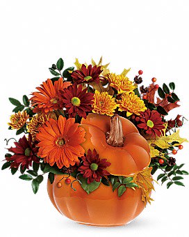 Country Pumpkin - This pumpkin is sure to please! Send your special someone  fall flowers and a keepsake gift with this reusable ceramic pumpkin arrangement. Includes gerberas, cushion mum, daisies, oak leaves, berries and autumn foliage.  Approximately 12&quot;x12&quot;