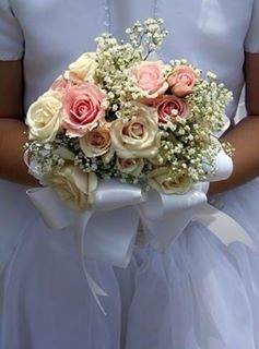 Wedding Bouquet - Custom Wedding Bouquets created with your vision in mind. Baby's Breath surroundings soft pink and white roses, hand tied with your choice of ribbon colors. For more pictures of our custom Bridal Bouquets.....visit our gallery &quot;Weddings&quot;.(Not available for same day delivery)
