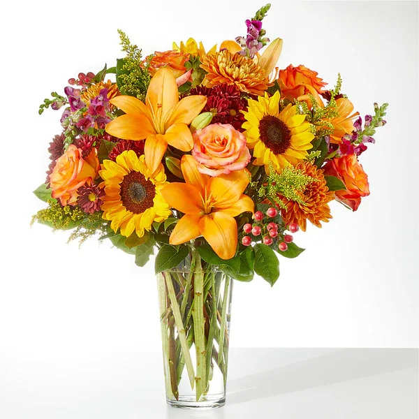 Seasons Change Bouquet - As the days get cooler and the sun sets earlier, this luxurious arrangement will remind them of the beauty of the season.  Details The Premium Bouquet is approximately 25"H x 21"W. Designed by florists, ready to display. For long–lasting blooms, replace the water daily. We suggest trimming the stems every couple days. Pet Safety Precautions: This bouquet or plant may include flowers and foliage that are known to be toxic to pets. To keep them safe, be sure to keep this arrangement out of your pet's reach.