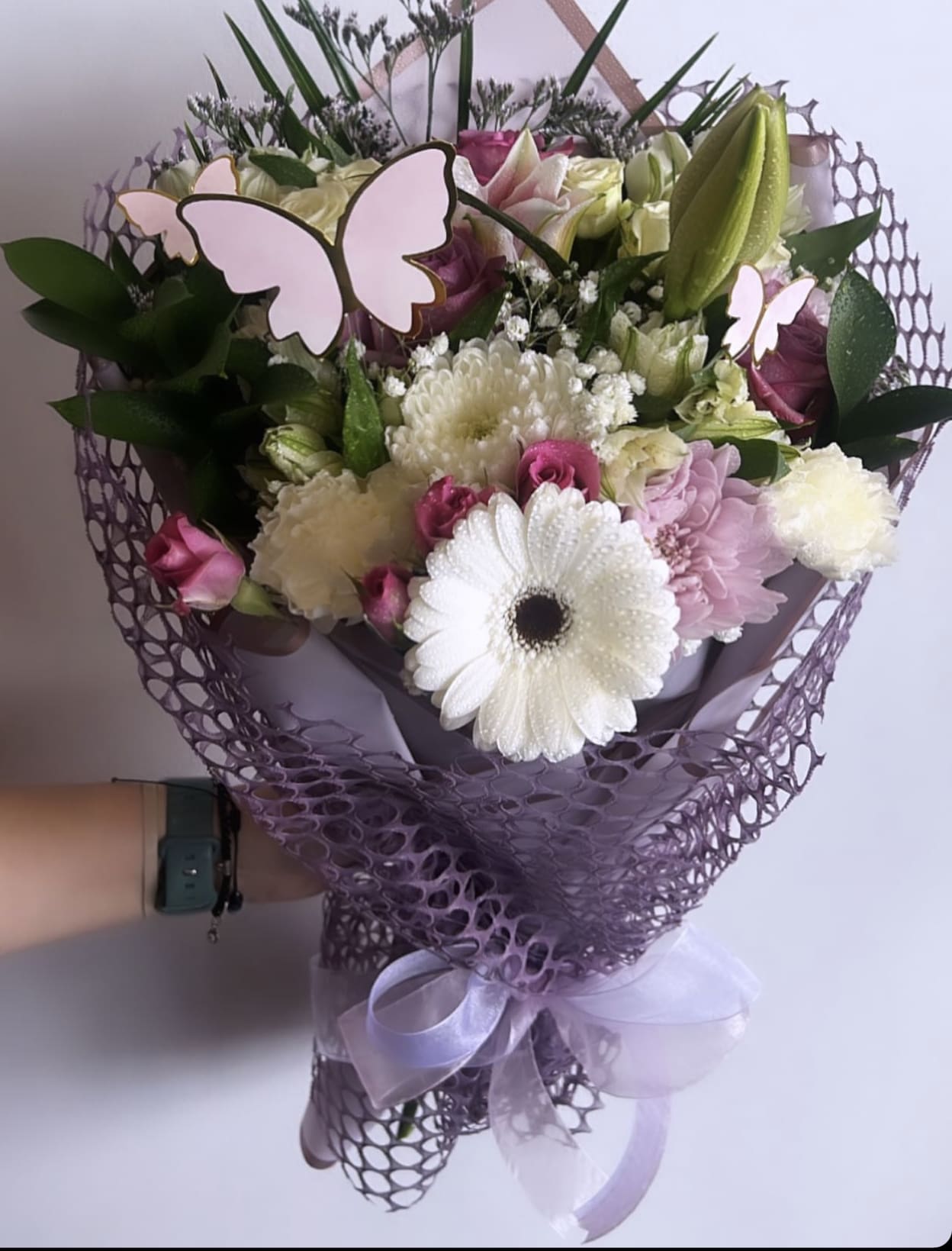 Purple Summer Hand Bouquet - Hand Bouquets DO NOT come with a vase!  Flowers may have to be substituted.. But you should recieve the same overall color and theme. 