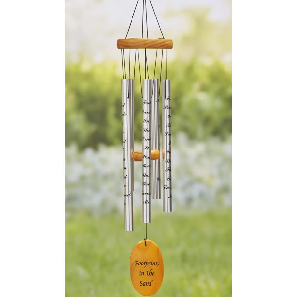 Footprints in the Sand- Windchime - This 33” wind chime features a touching sentiment that soothes a grieving heart. It plays a melodious sound in the breeze and has an attractive finish that looks great in your garden or on your porch. The chime reads "Footprints in the sand; It was then that you carried me". This set of engraved wind chimes are a thoughtful sympathy or memorial gift or to show encouragement during any tough time. Aluminum, wood and cotton. 4-1/2" dia. x 33"L. Wind chime features a touching sentiment that soothes a grieving heart It plays a melodious sound in the breeze and has an attractive finish that looks great in your garden or on your porch. The chime reads "Footprints in the sand; It was then that you carried me". This set of engraved wind chimes are a thoughtful sympathy or memorial gift or to show encouragement during any tough time. 4-1/2" dia. x 33"L