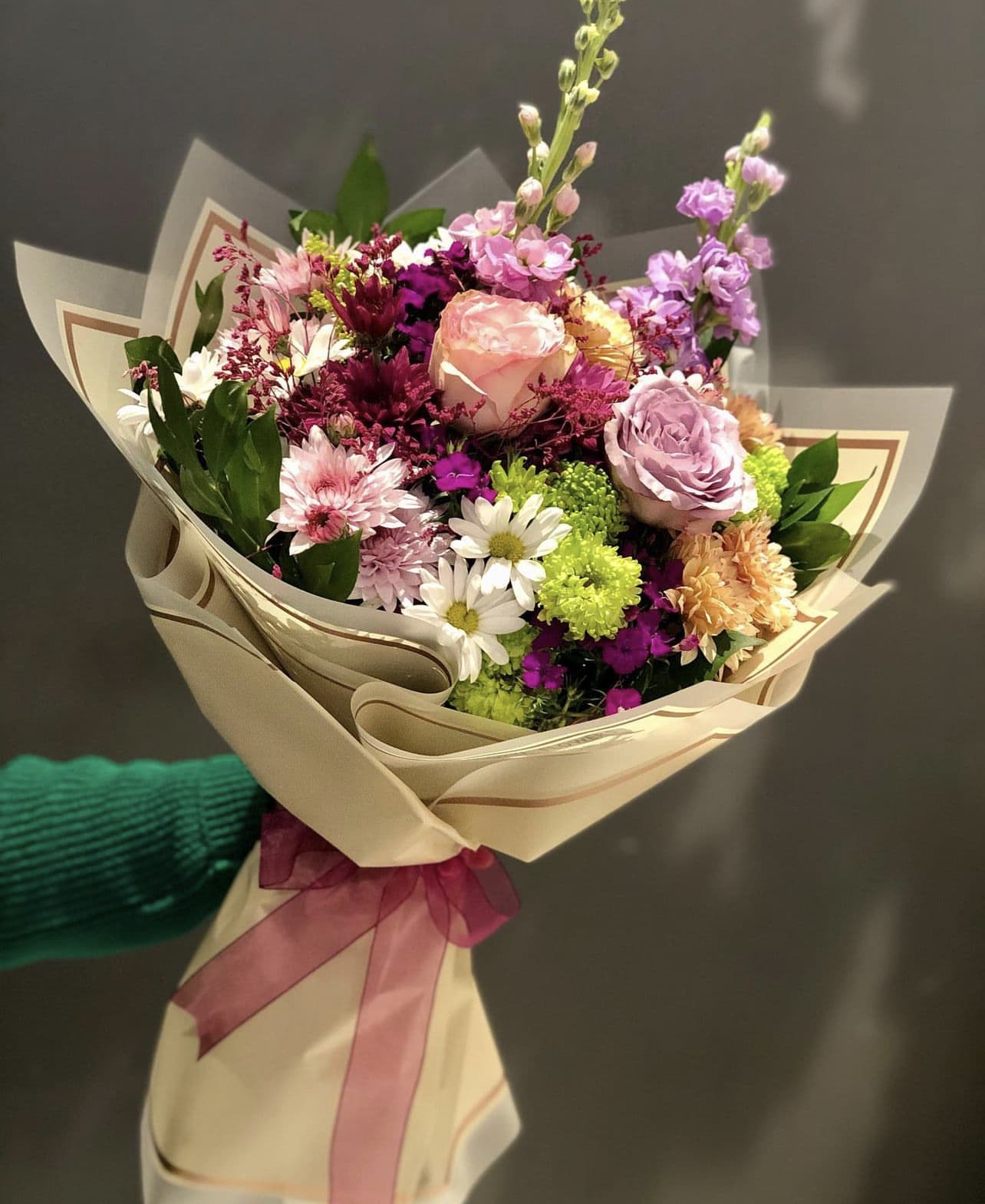 Mixed Dreams Bouquet - DESCRIPTION: BOUQUETS NEVER EVER are identical, they come out different every time please keep this in mind! your bouquet will have similar flowers, similar colors and similar theme :-)  if youd like to customize your rose color or wrapping color please give us a call and we will give you alot more options over the phone! 937-689-6325  Note: Hand bouquets do not include a vase.