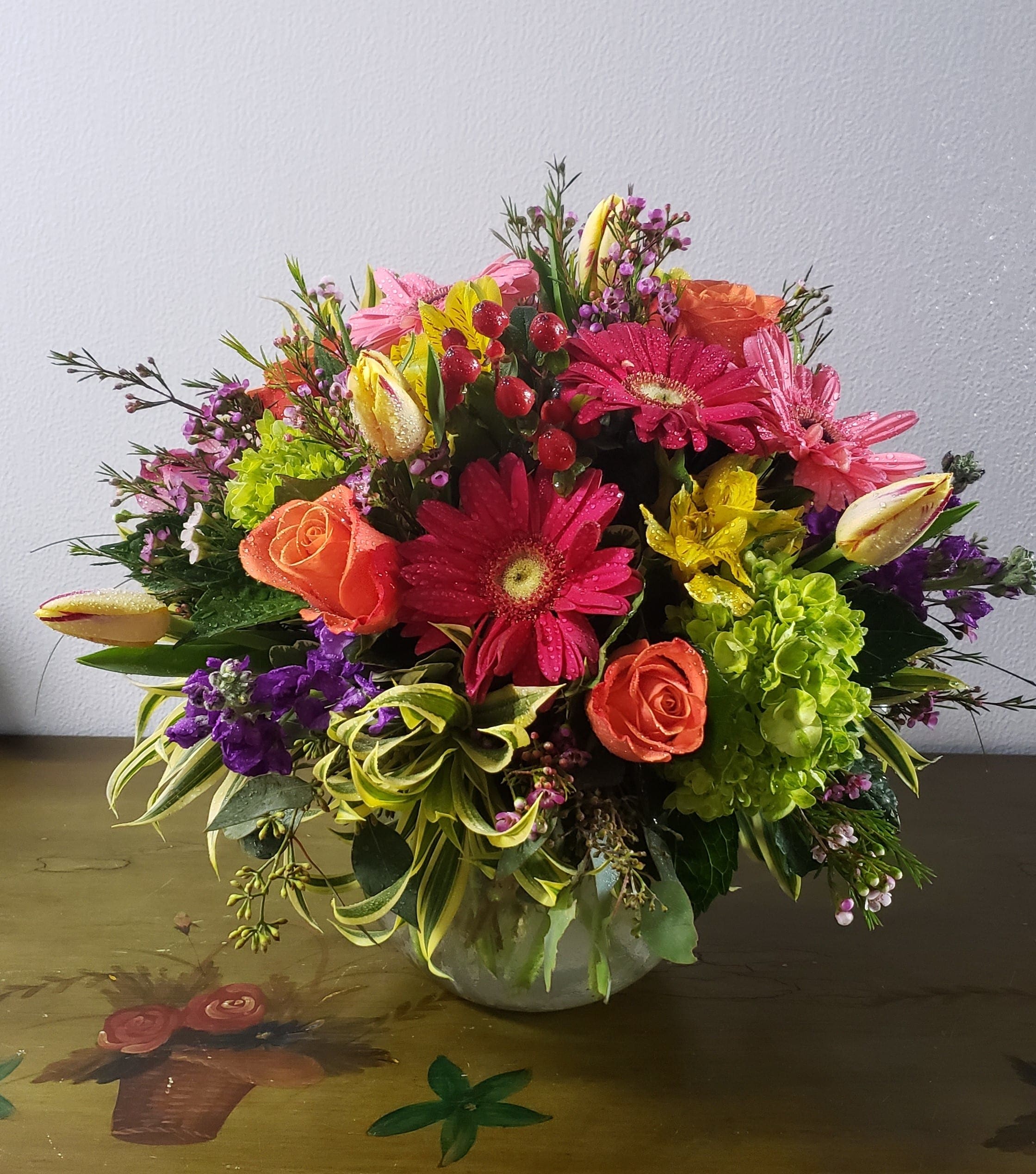 Just Because  - Elegant 8&quot; clear  glass bowl, filled with seasonal flowers such as roses, spray roses,tulips, Gerbera daises ,&amp; other seasonal flowers. ( color may very )