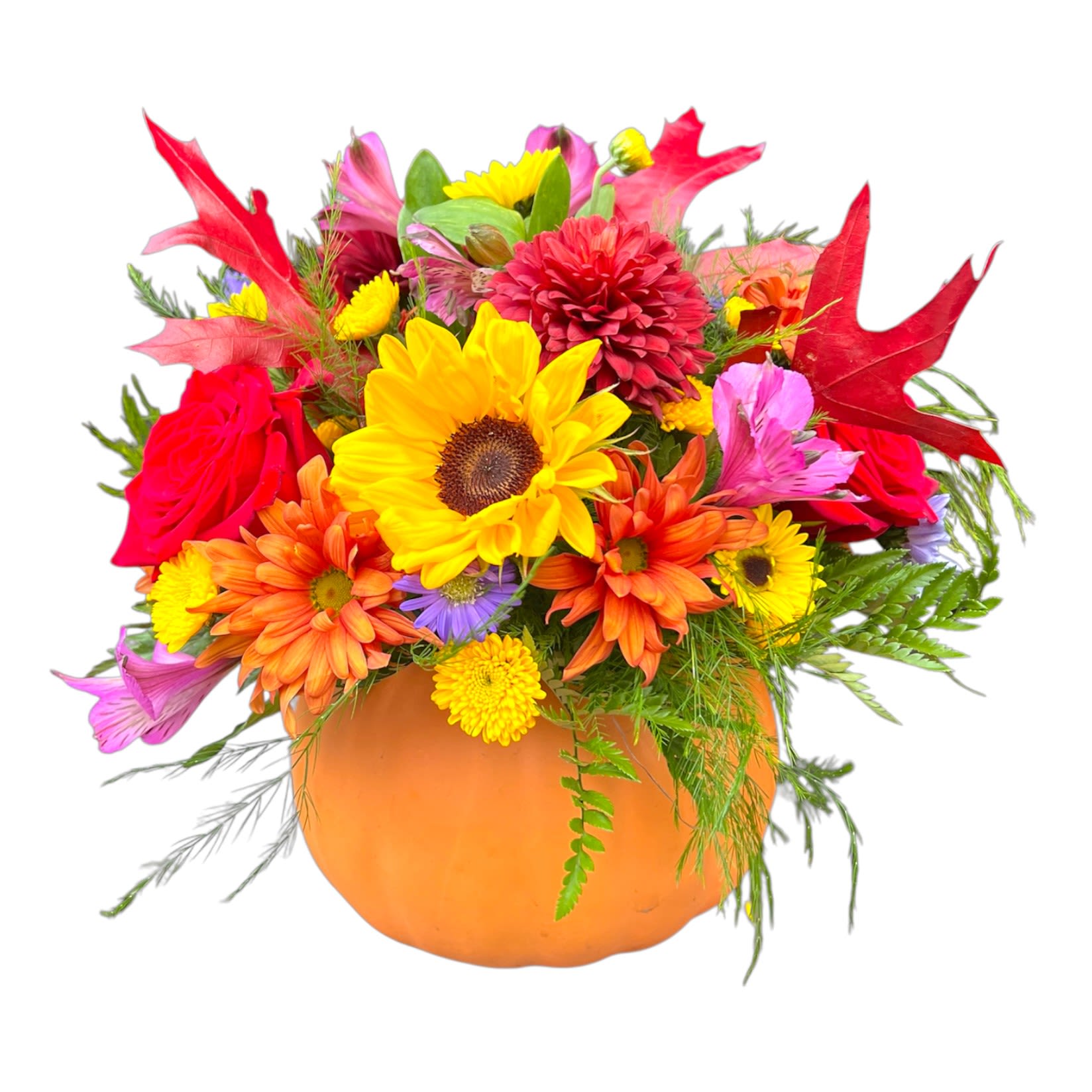 Pumpkin Spice Arrangement  - A ceramic pumpkin  overflowing with gorgeous fall flowers will compliment your dining table or an entryway any time this season, and from Halloween to Thanksgiving. When the flowers fade, pumpkin can be used to hide sweet treats or cookies.
