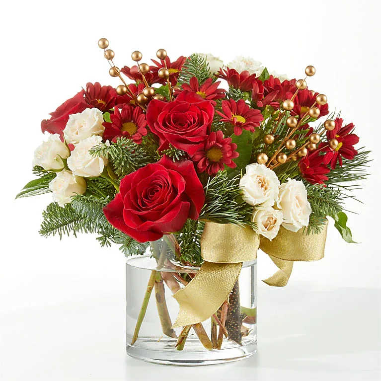Believe Bouquet - AVAILABLE STARTING 12/1   Seasonal offering with red roses, white mini roses, Christmas greens and filler finished with a gold berries and a bow.