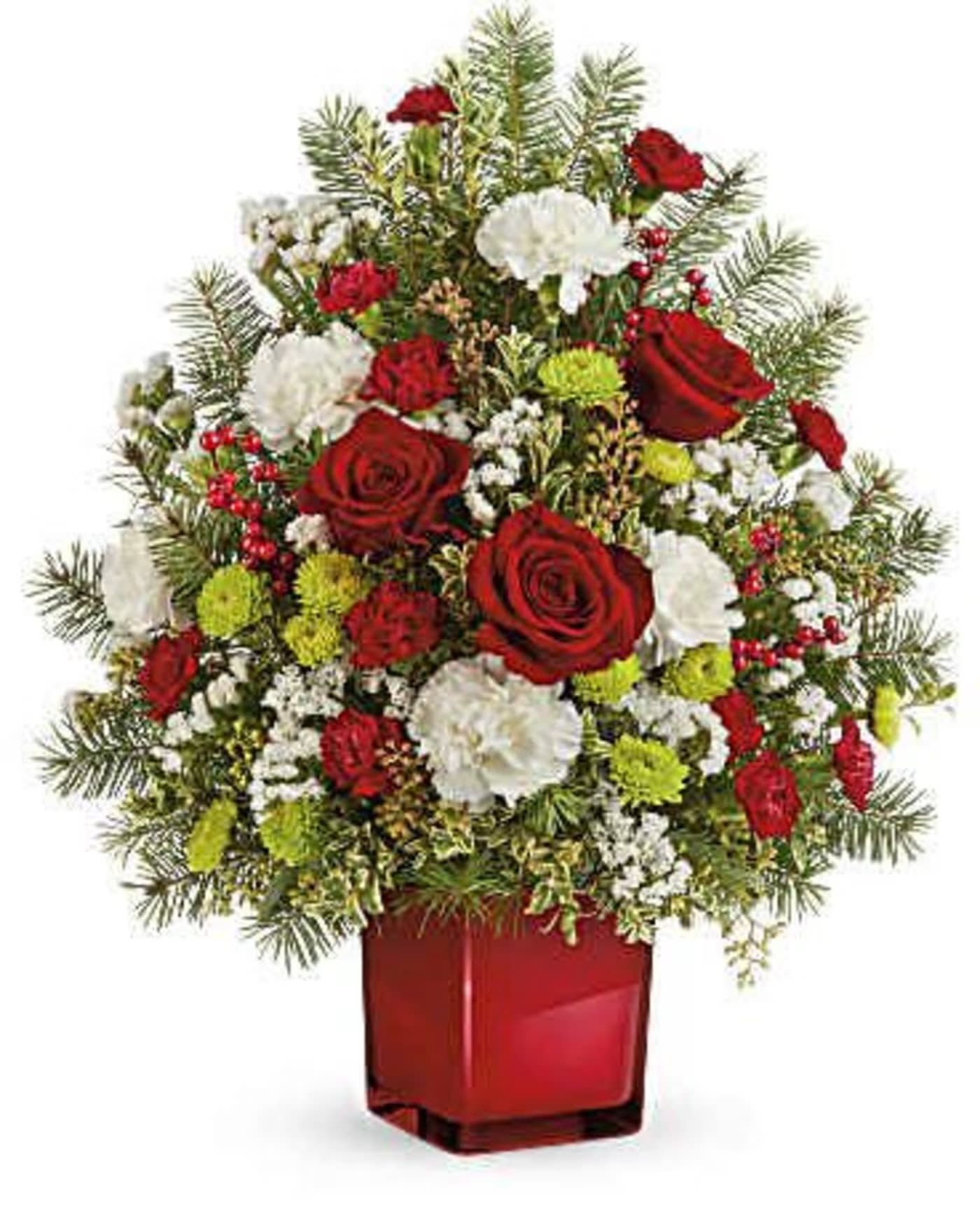Radiant Winter Tree  - AVAILABLE STARTING 12/1  Illuminate the season with our Radiant Winter Tree from Flower Synergy, a vibrant and cheerful holiday design in classic shades of red, green, and white. This festive floral tree features premium roses, lush carnations, seasonal berries, and fresh Christmas greens, elegantly arranged in a rich red cube vase for a bold and joyful holiday statement.  The standard option is crafted as a one-sided arrangement, perfect for entry tables, counters, or office desks. The premium option is designed all-around for a fuller, more abundant presentation. Each Radiant Winter Tree measures approximately 13 x 21 inches.  Perfect for holiday gifting, Christmas décor, and winter celebrations, this arrangement brings warmth, color, and festive charm to any home or office in Costa Mesa, Newport Beach and surrounding Orange County areas.