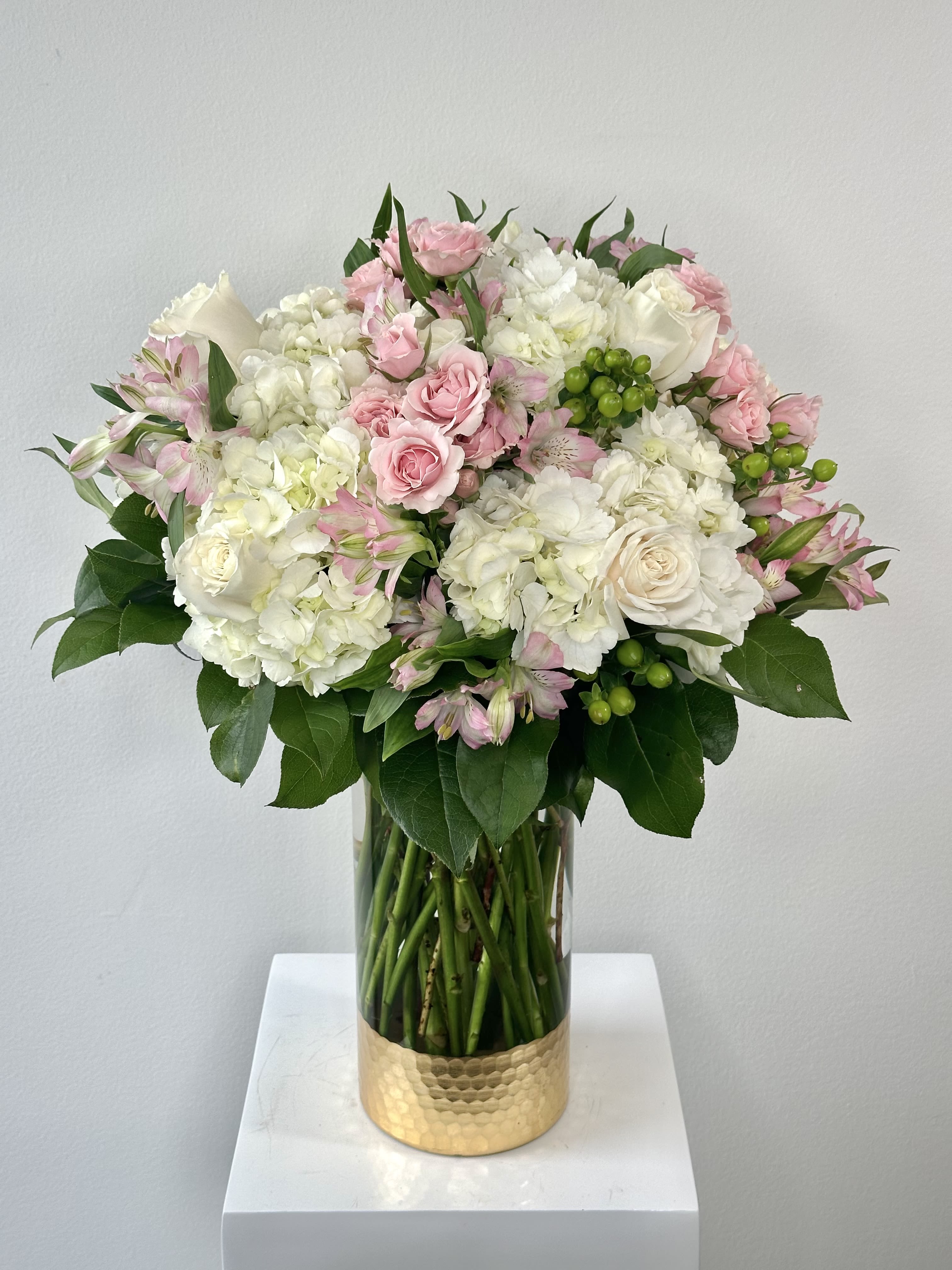 Extravagant Parisian Stroll - Welcome the Extravagant Parisian Stroll! This stunning bouquet is an upgrade from one of our best-sellers, the Parisian Stroll. It stands a whopping 23 inches tall with a width of approximately 16-17 inches wide. It features the same gorgeous flowers: white and pink roses, hydrangeas, hypericum berries, and alstroemerias. The Extravagant Parisian Stroll is the perfect surprise for someone who deserves that extra mile!