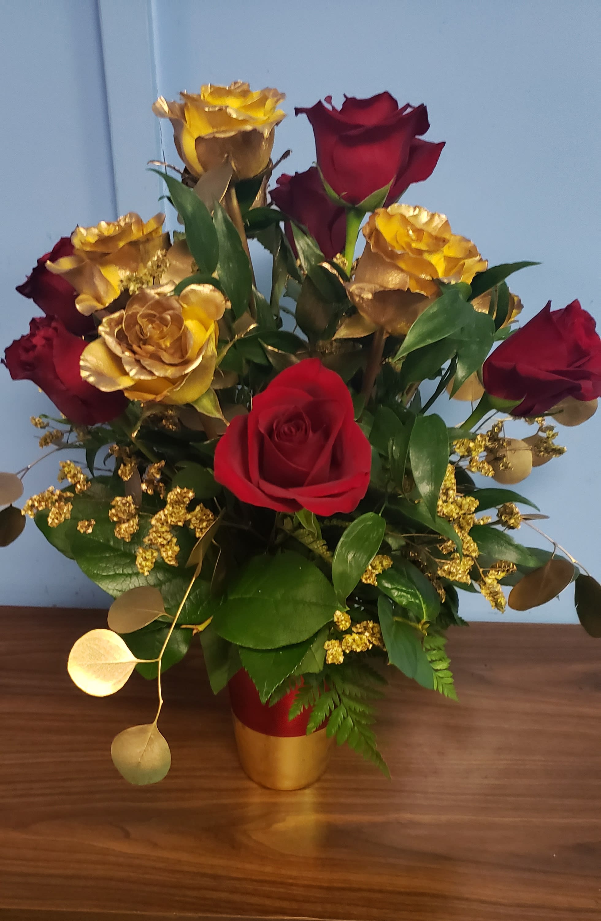 Rose Gold  - 1 dozen Rose's in red and gold in a matching vase with gold filler foraccents. 