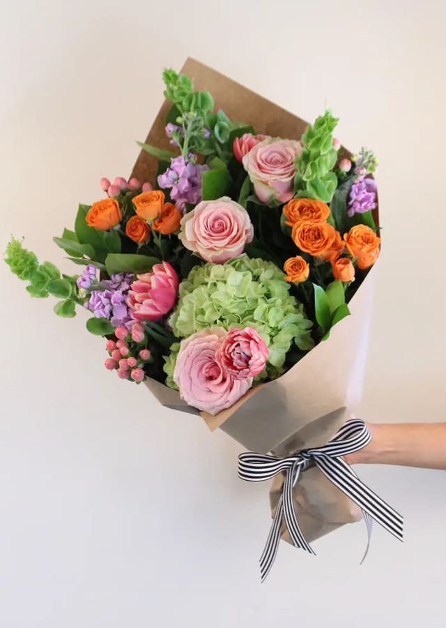 Sweet Sweet Fantasy Wrapped Bouquet  - Sweet Sweet Fantasy Wrapped Bouquet includes hydrangea, roses and other fresh flowers. Our loose bunches do NOT include vases. Paper and bow color will vary.