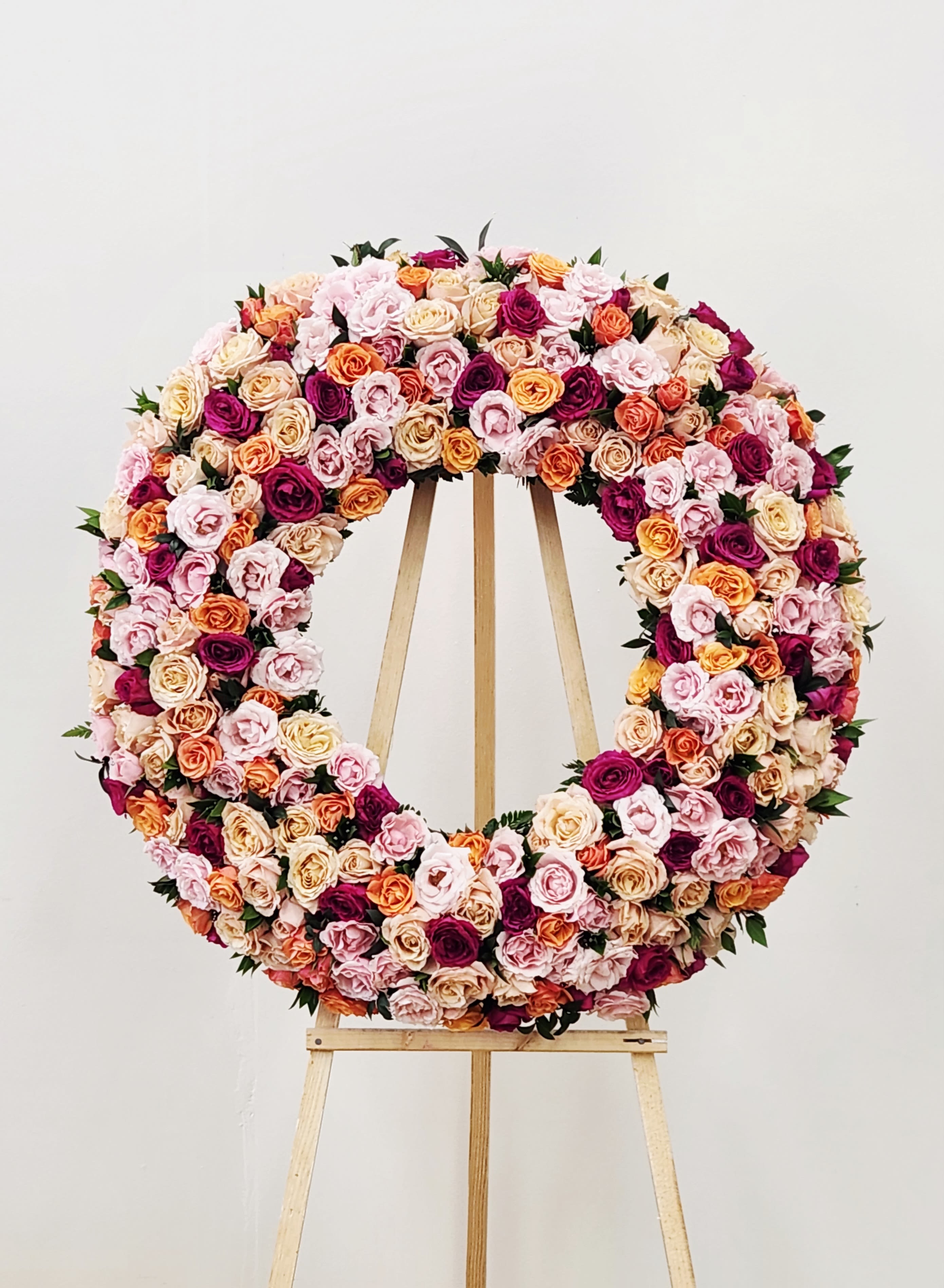Garden Rose Wreath - The Garden Rose Wreath brings a delicate and luxurious touch to any space, thoughtfully crafted to express care and compassion. Its soft blooms create an inviting aura, perfect for moments when you want to share warmth and heartfelt devotion. This wreath embodies gentle elegance that comforts and uplifts.  Standard: 18&quot;  Deluxe: 24&quot;  Premium - As Pictured (As Pictured): 30&quot;