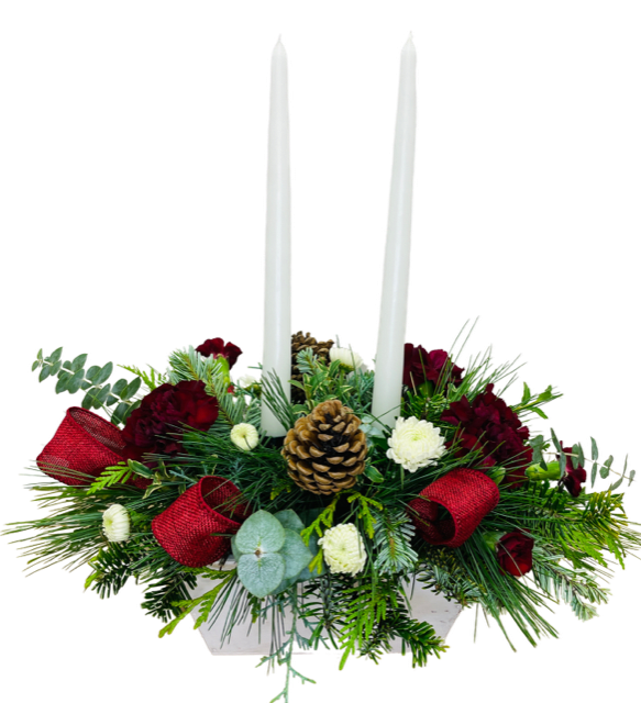 Florist's Choice Centerpiece - A Christmas centerpiece featuring 2 tapered candles, with seasonal greenery, pinecones and fresh florals. 