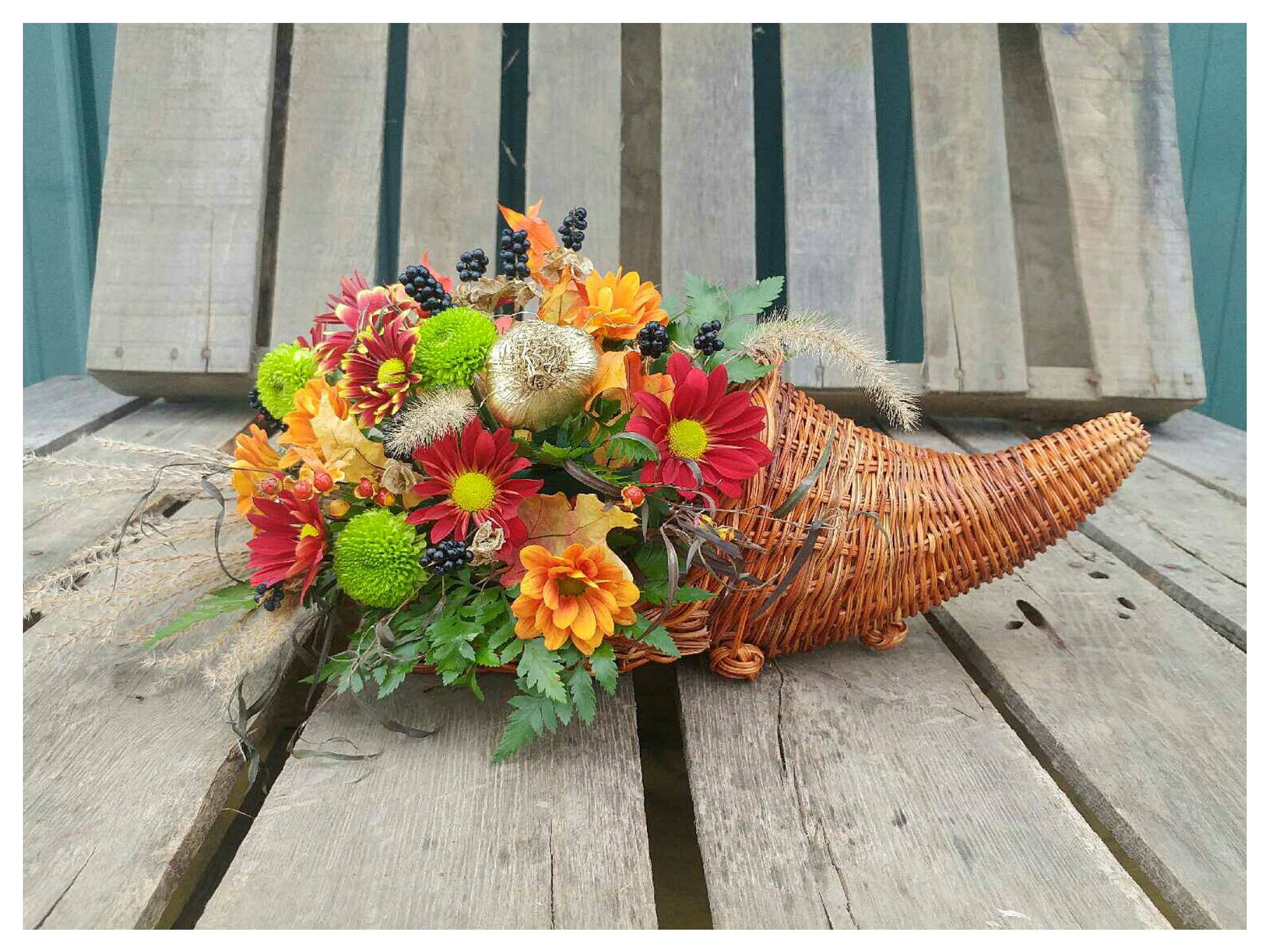 Festive Cornucopia Basket  - Festive fall arrangement in a wicker cornucopia 