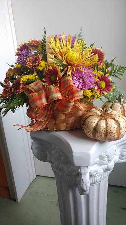 Grateful Basket - A mixture of fall blooms in a beautiful basket with ribbon.