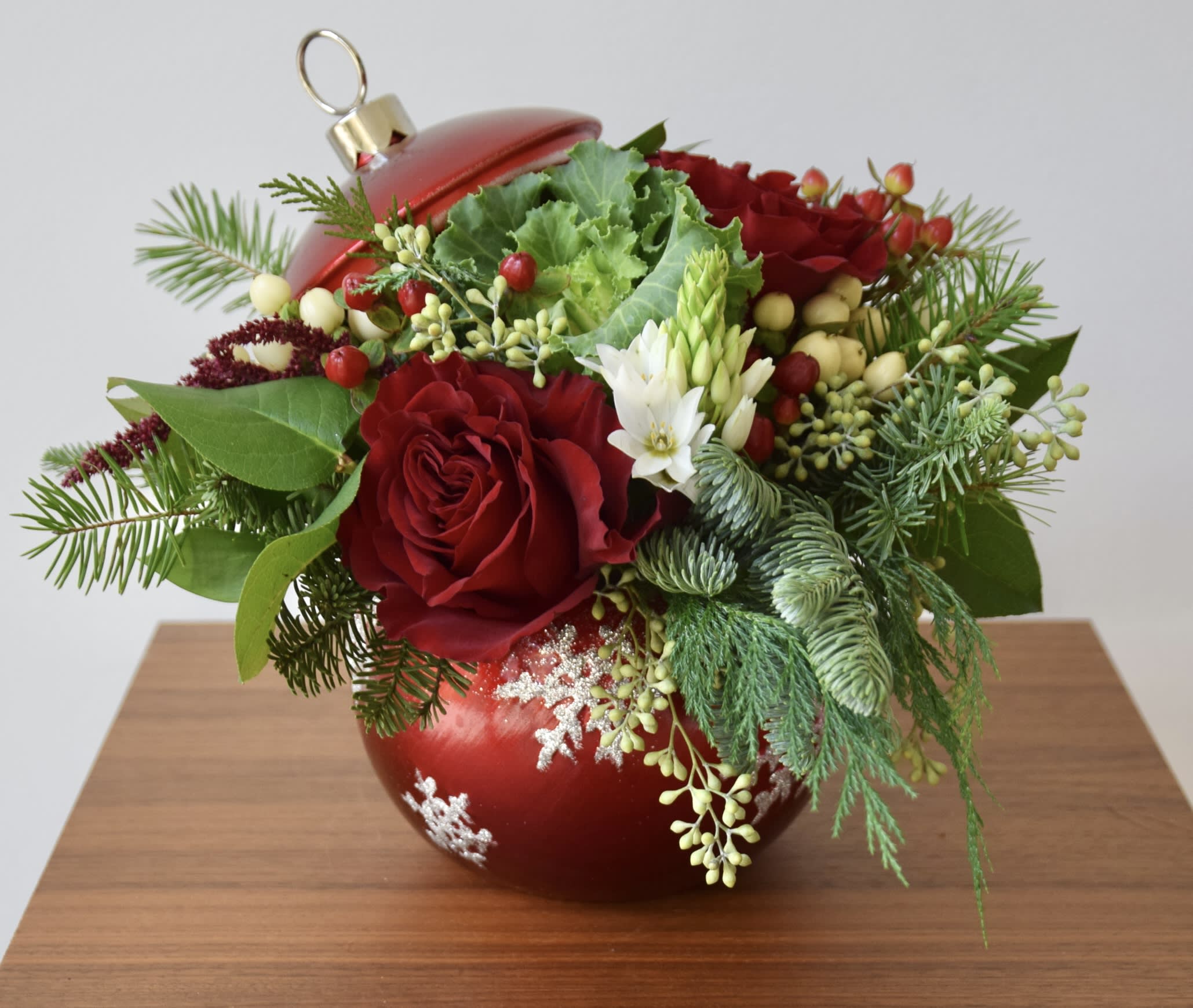 Christmas Ornament - Christmas ornament flower arrangement - a lovely Christmas gift and holiday table decor with fresh evergreens, red roses and berries, embellished with a touch of white blooms and seeded eucalyptus. The ornament vessel is 6-8inch large.