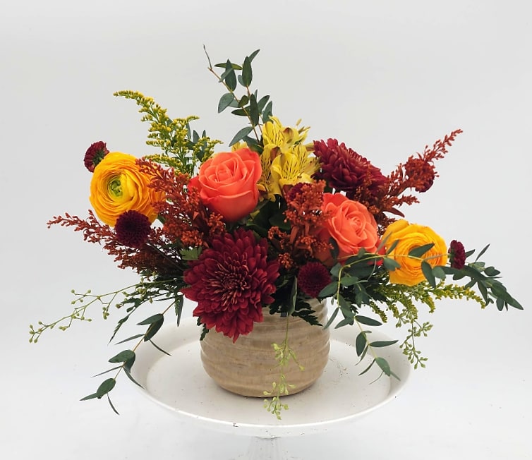 Fall Explosion by Lynn - A firework of fall colors. This light and airy arrangement is sure to light up any room.