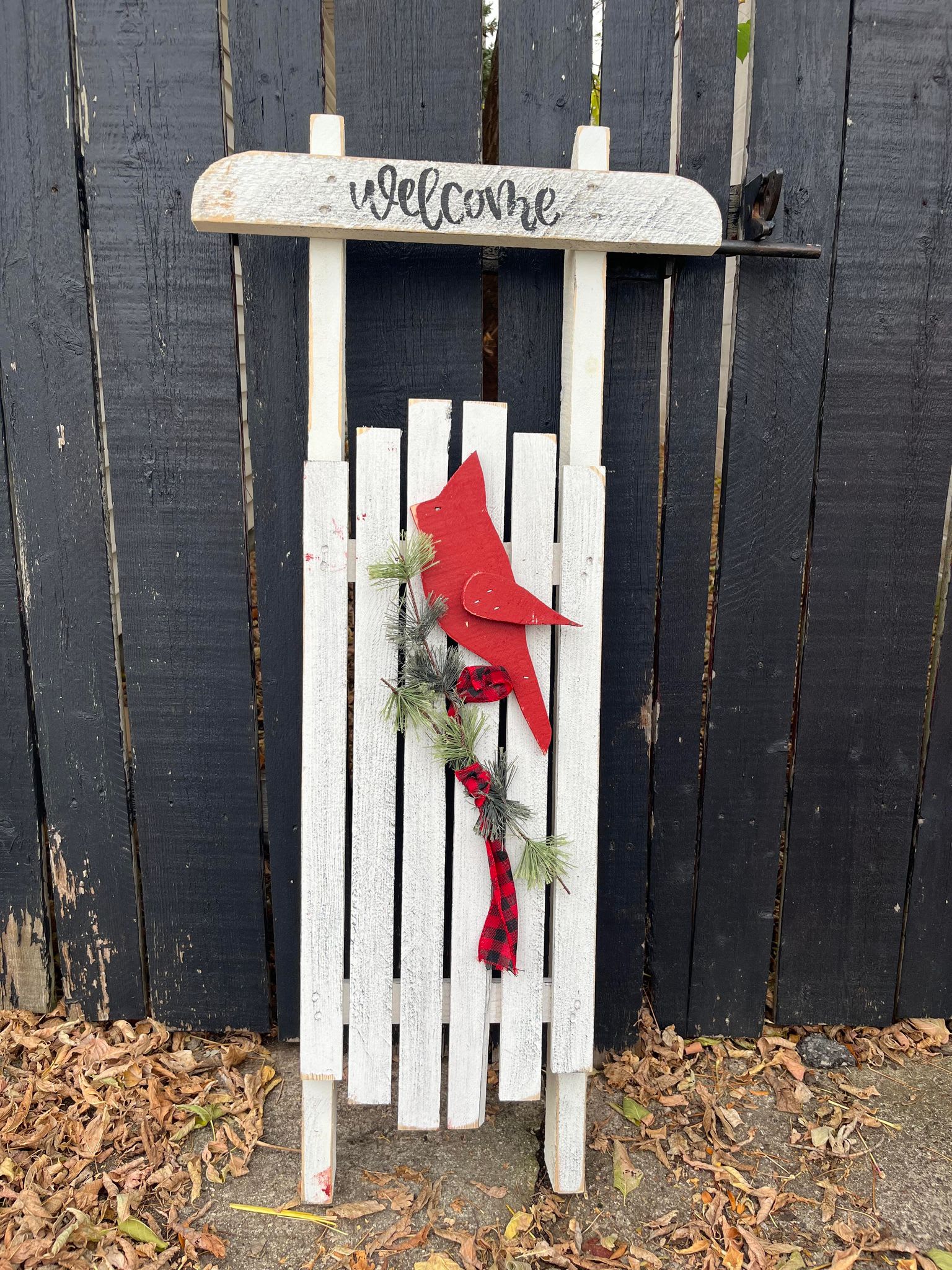 Sled With Cardinal - White wooden sled with cardinal. Leaner.   Made in the USA