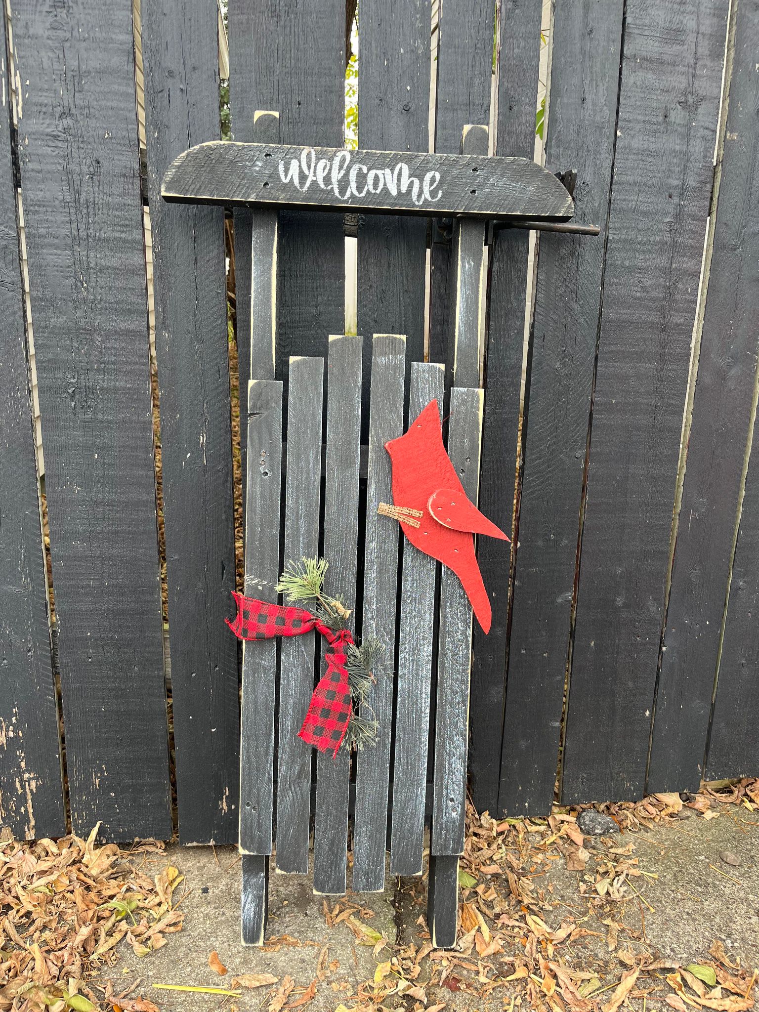 Black Wooden Welcome Sled with Cardinal - Black wooden welcome sled with cardinal attached. Leaner   Made in the USA