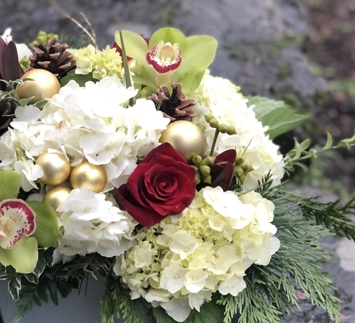 Designer Choice-Holiday Arrangement  - Leave it up to us and we will create a one of a kind holiday arrangement sure to add holiday cheer to anyones home 