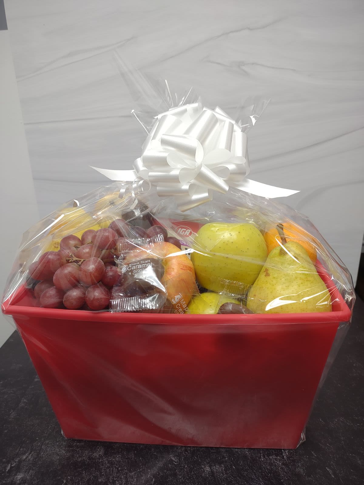Small Fruit Basket - Gift a little sweetness with this small assortment of fresh fruits, nuts and gourmet chocolates.