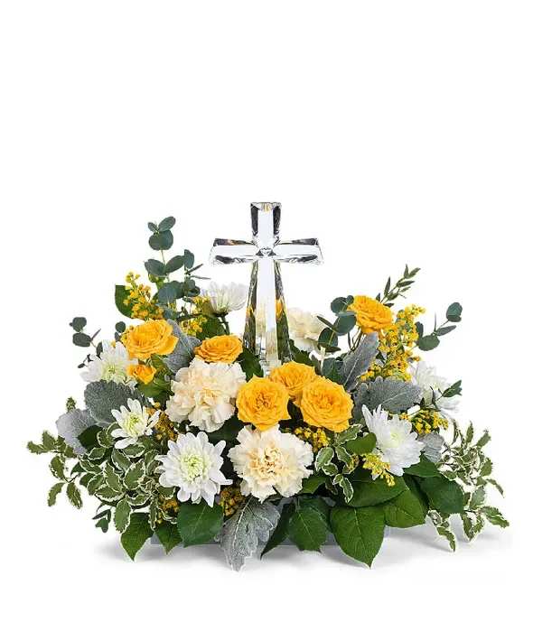 Holy Cross Devine Light Bouquet - This precious keepsake bouquet is sure to lift anyone's heart while sending your message of comfort and hope. A gorgeous wreath shaped bouquet of mums, carnations, and roses encircles a beautiful crystal cross that they can display in their homes and keep as a memory of good times long after the flowers are gone. Please note, roses are only included in deluxe and premium sizes.