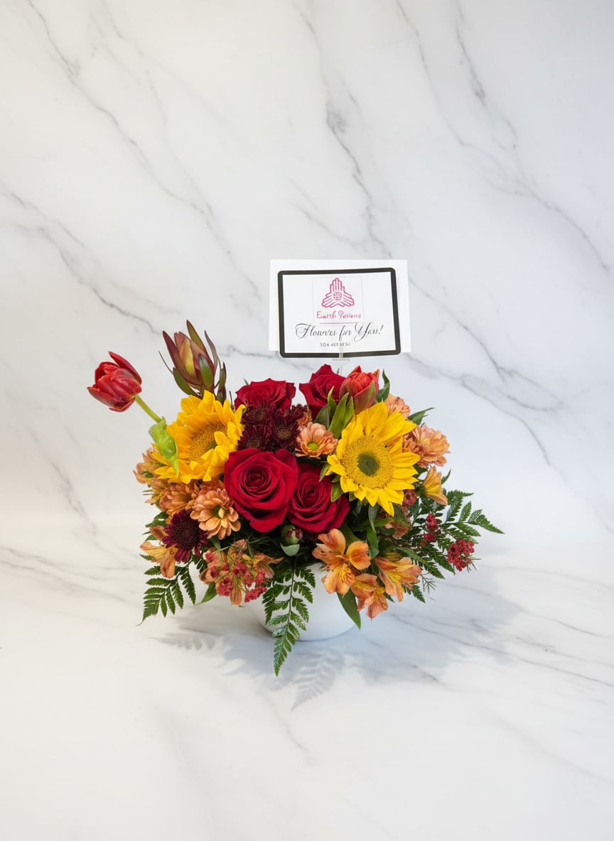 Fall Deluxe Centerpiece  - Bring warmth to your Thanksgiving table with our deluxe fall centerpiece—overflowing with rich, seasonal blooms to make your celebration cheerful and memorable.  Visit www.earthpotionsnola.com or call to place your order today. Pre-orders are highly recommended!