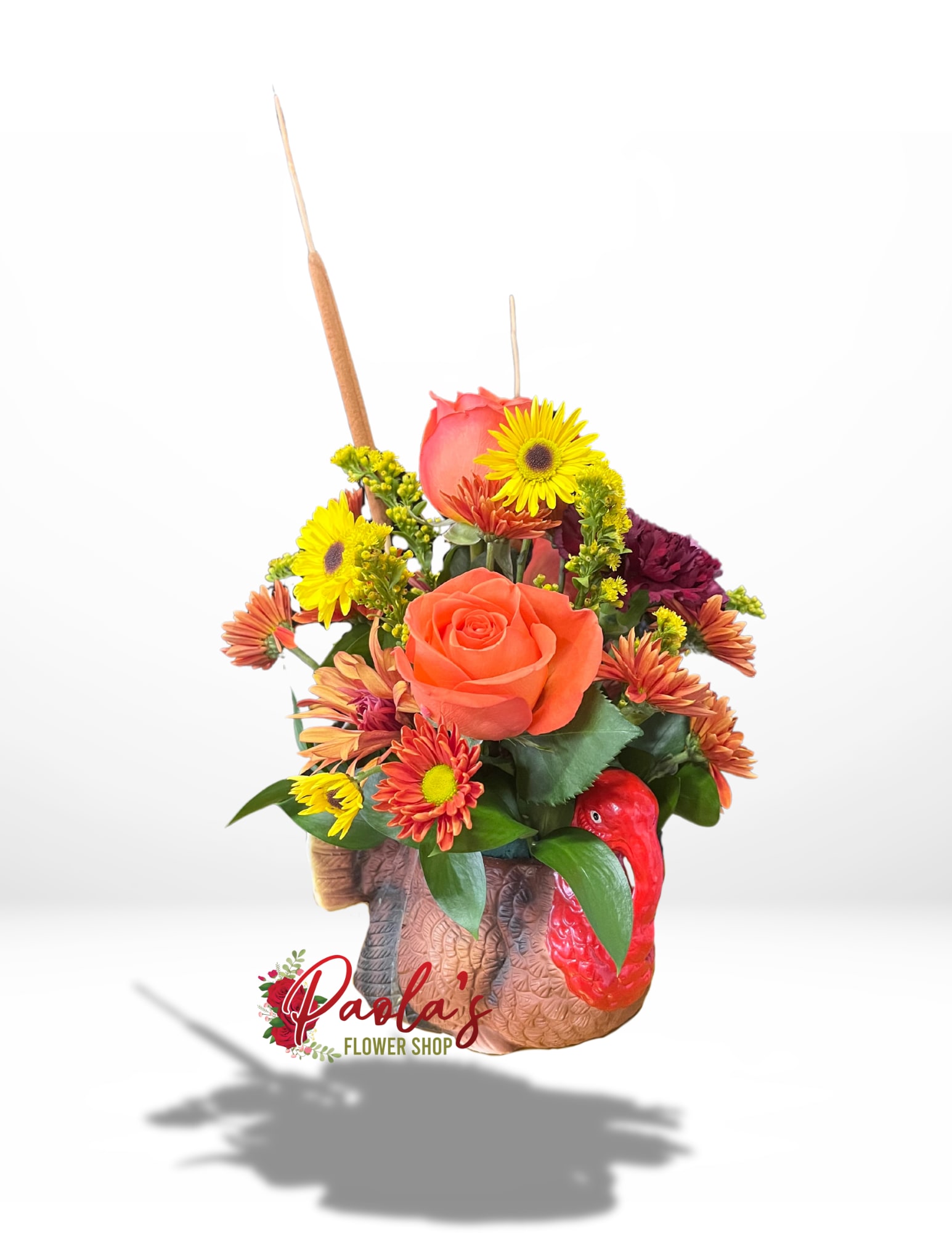 It’s Turkey Time!  - This Thanksgiving, feast your eyes on a stunning arrangement nestled in an adorable ceramic turkey! It's a floral feast that'll make your heart gobble with joy!