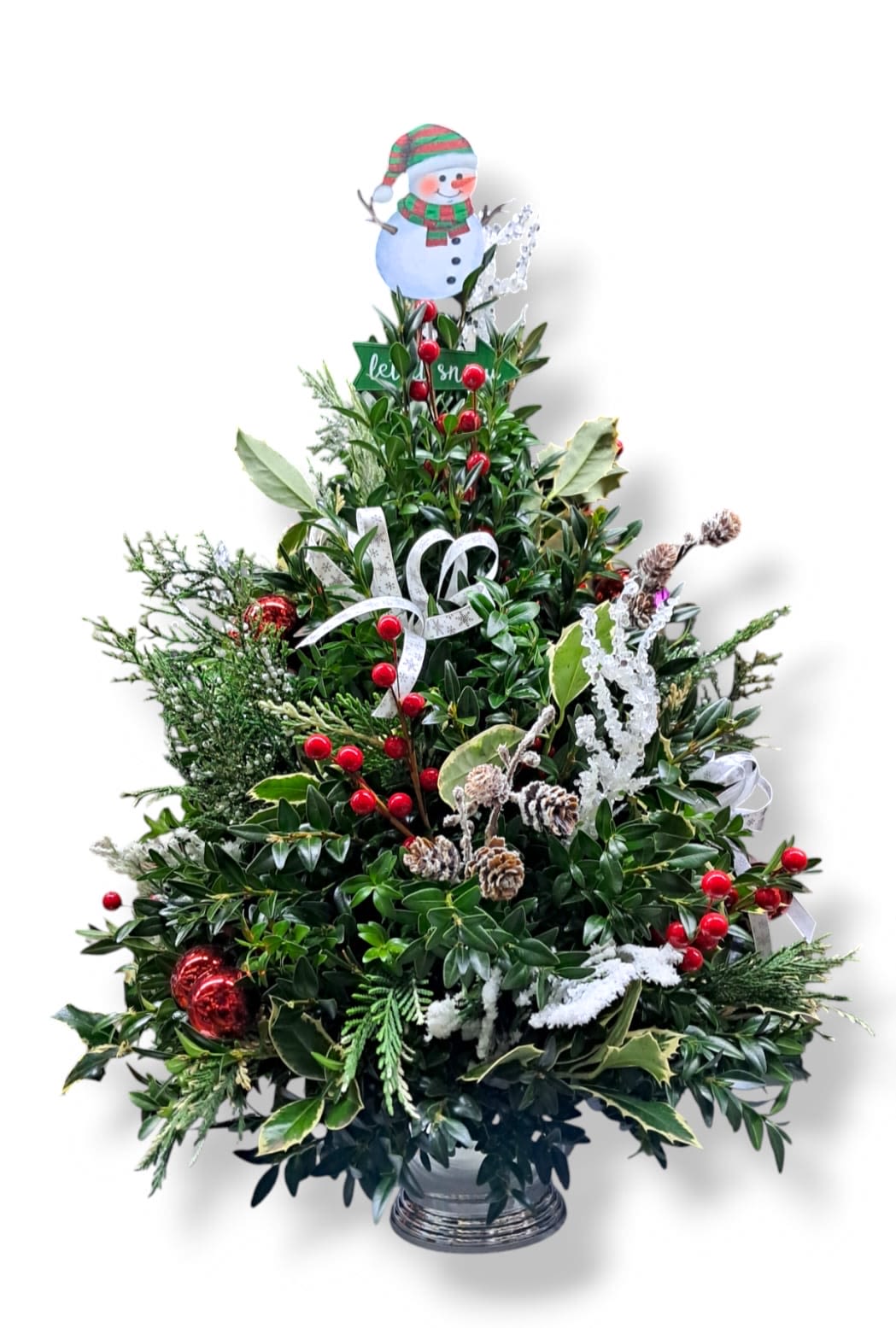 Frosty Tree - This mini tree is adorned with artificial berries, holly, ornaments, bows and pinecone.