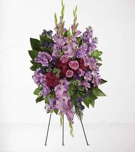 Lavender Grace Spray - Send your deepens condolences with beautiful purple blooms mixed with calming lavender. The Lavender Grace Spray is a joyous expression of your sympathy.