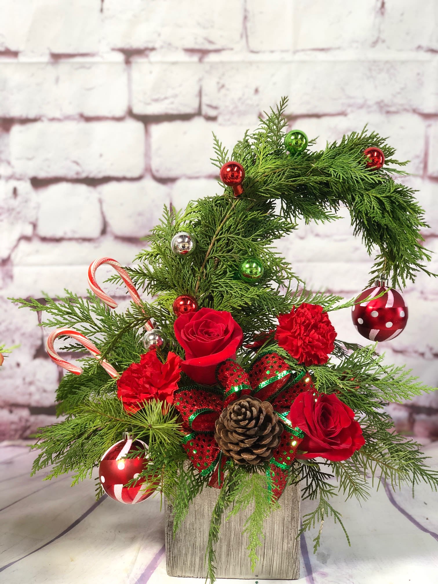 Who Stole Christmas?? - Cute Christmas tree decorated with fresh flowers, ornaments and candy canes. Flowers may vary as well as ornaments and decorations. WHO wouldn't love it?