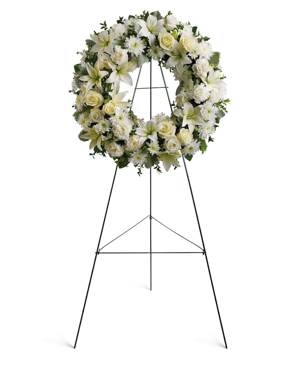 Serenity Wreath - A classic and elegant standing wreath crafted with pure white blooms.