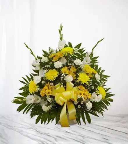 Treasured Memories Floor Basket - Yellow - Send a beautiful expression of your love and support during this difficult time. Our florists use only the freshest flowers available, so colors and varieties may vary.