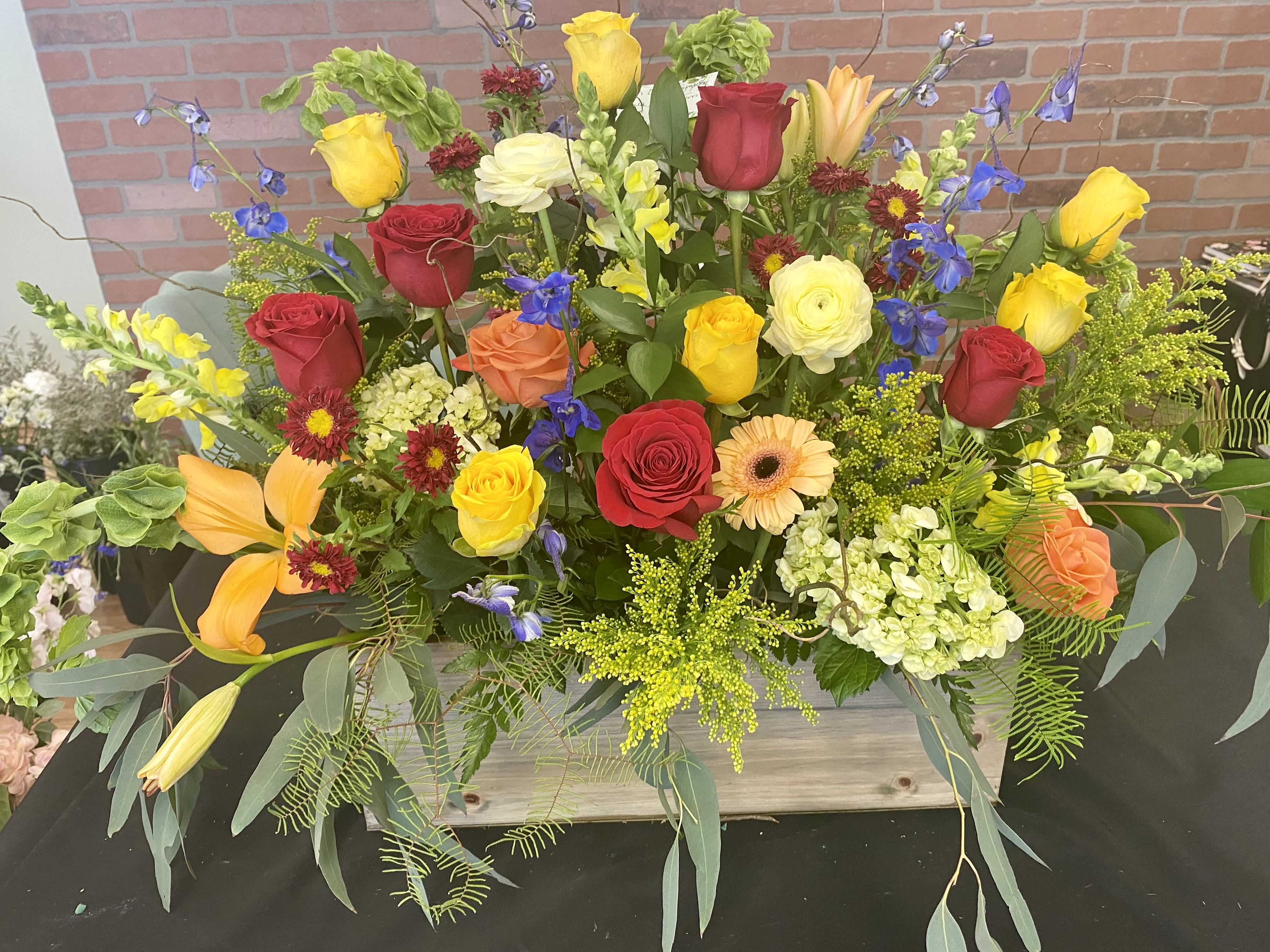 Country Meadow - Colorful blooms designed beautifully in a wooden box filled with texture 