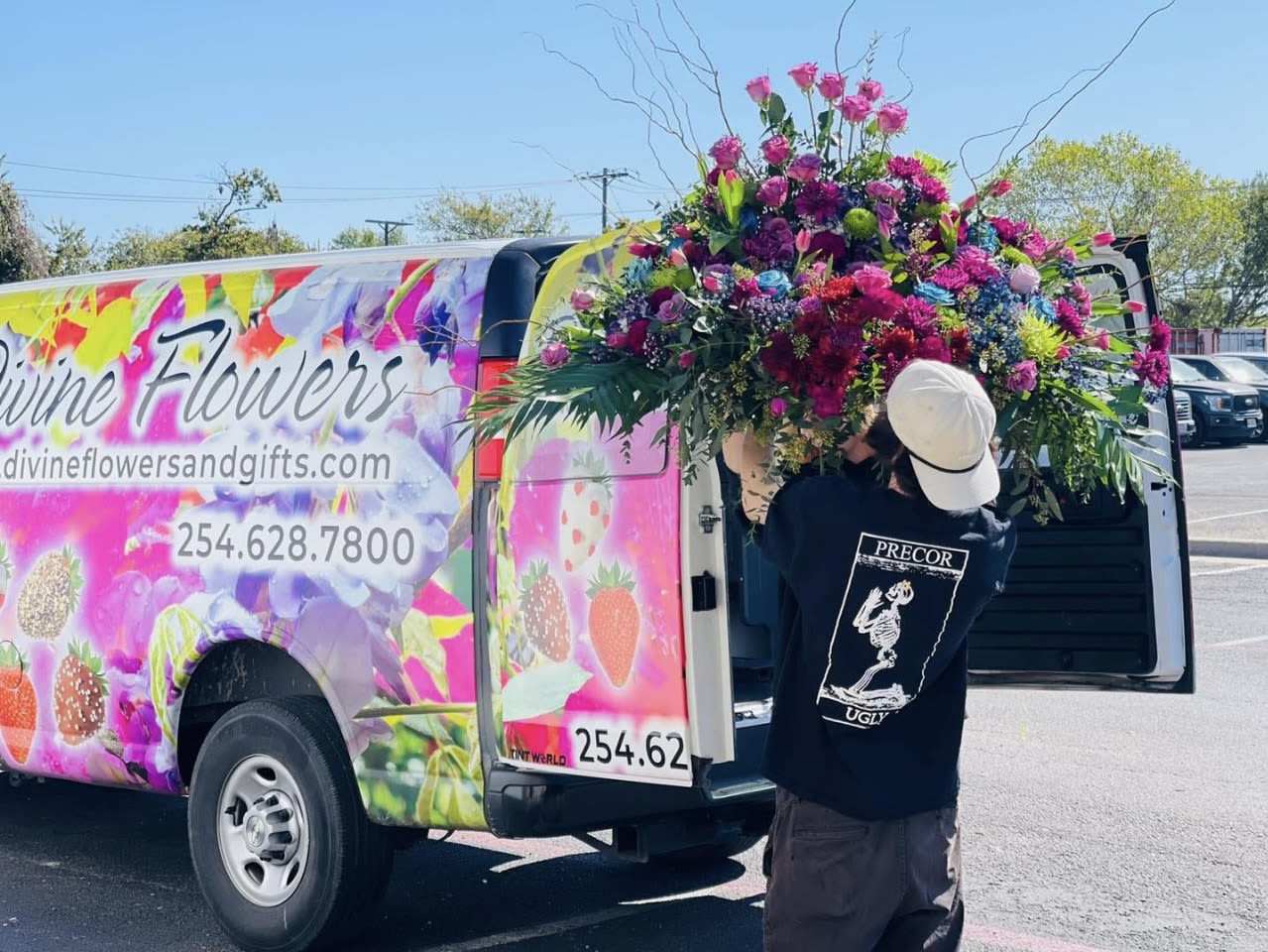 Lavender Serenity Casket Spray  - This purple lavender casket spray is a serene and graceful tribute, designed to honor a life with beauty and tenderness. Soft lavender blooms blend with rich purple accents, symbolizing peace, dignity, and everlasting love. The soothing color palette brings a sense of calm and comfort, while the lush arrangement drapes the casket in a blanket of elegance and heartfelt remembrance. A timeless expression of respect, this spray offers a peaceful farewell filled with love and serenity.