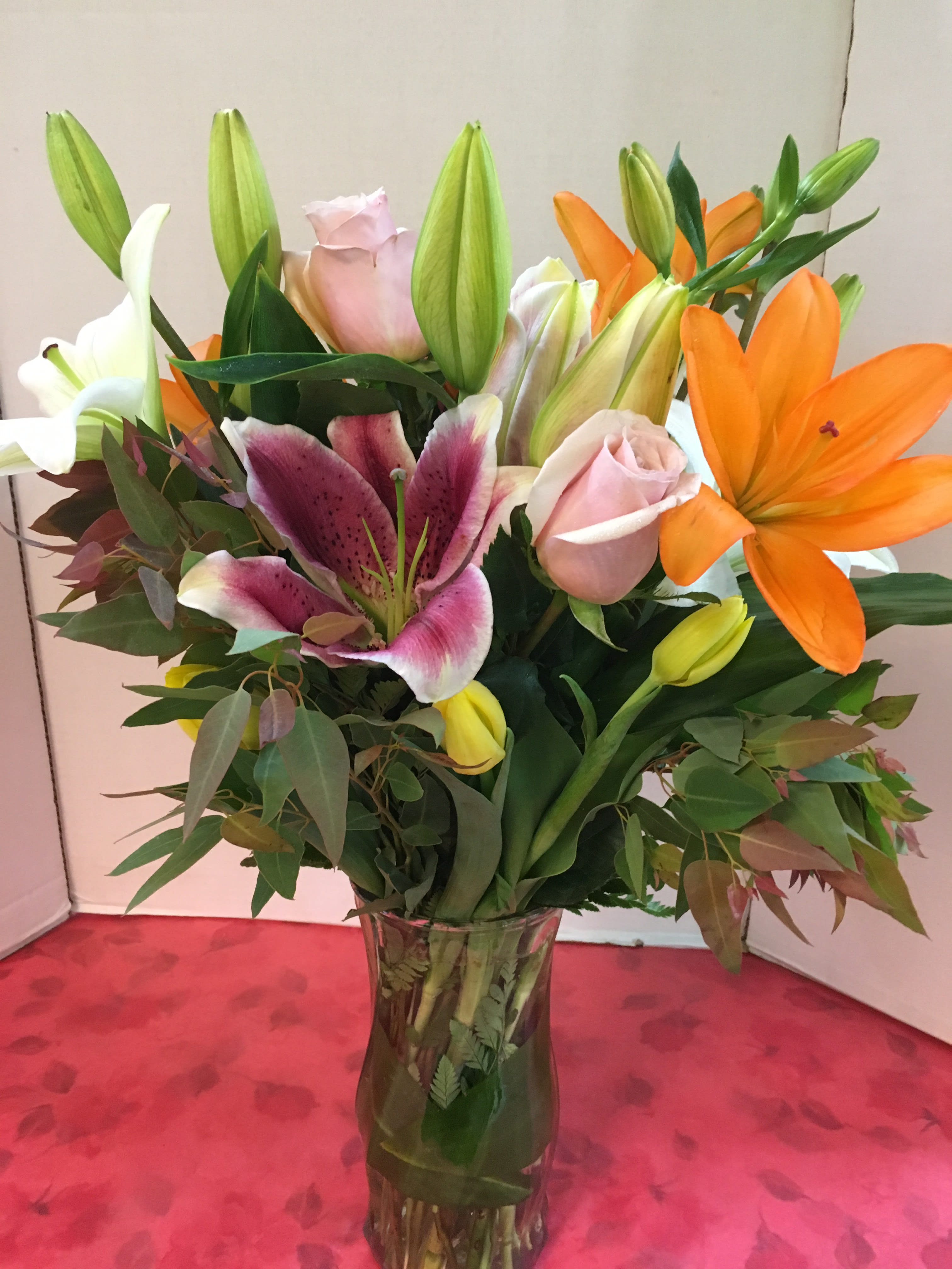 Color Scheme Stunning Arrangement - Assorted Lilies,  Roses, Tulip(seasonal),  