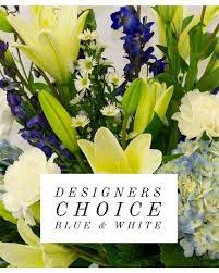 Blue and White Designers Choice Bouquet - Blue and white blooms arranged in vase or container. Please specify any requests in the special instructions. The photo is a stock image for reference only. Flowers will vary based on fresh inventory.