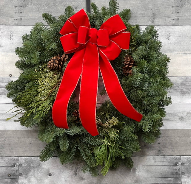 Christmas Wreath - 24&quot; Noble fir wreath, with holiday bow.  The Deluxe and Premium wreaths have added decorations.