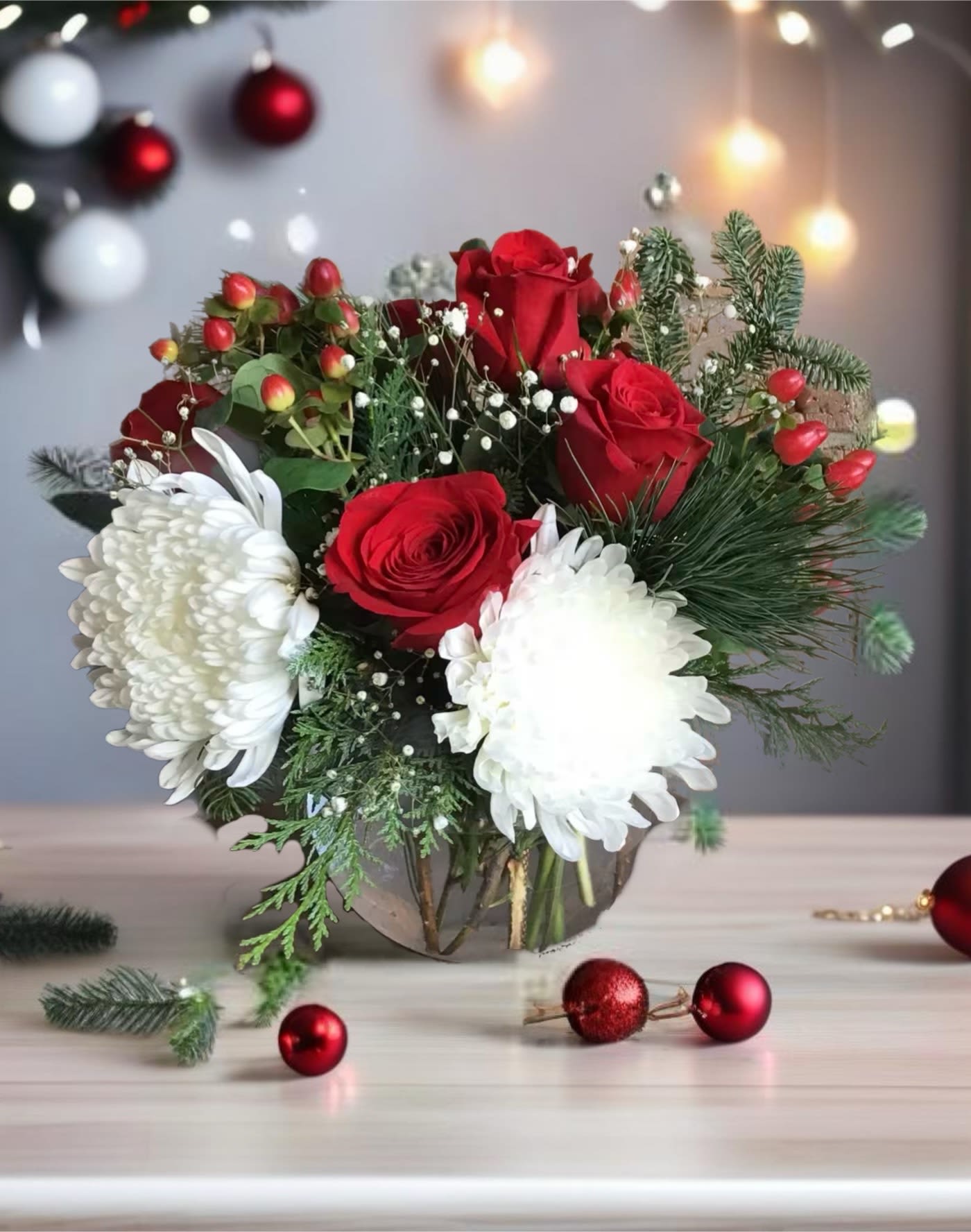 Holiday Charm - Clear glass bubble bowl of beautiful football mums, roses, hypericum berry &amp; mixed greenery. Very classic!