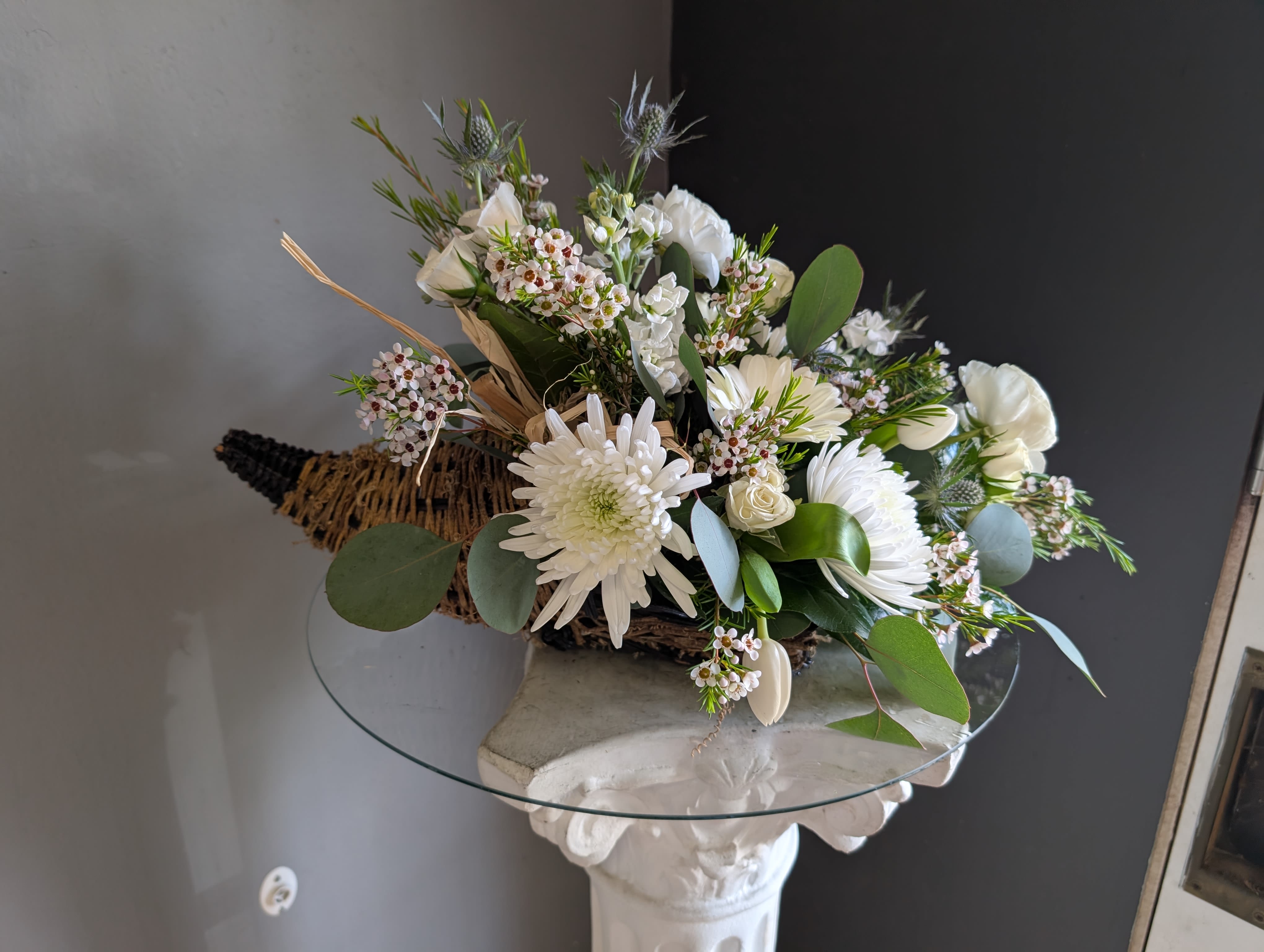 Holiday Centerpiece Table of 6 - Beautiful arrangement of fresh flowers displayed inside a cornocopia 