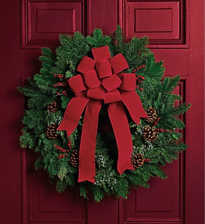 Classic Holiday Wreath - It's not Christmas without a fresh Christmas wreath on your door! Send the spirit of the season to someone special with this classic piece of holiday decor. The 28-inch wreath is composed of fragrant noble fir with touches of juniper and red berries. 