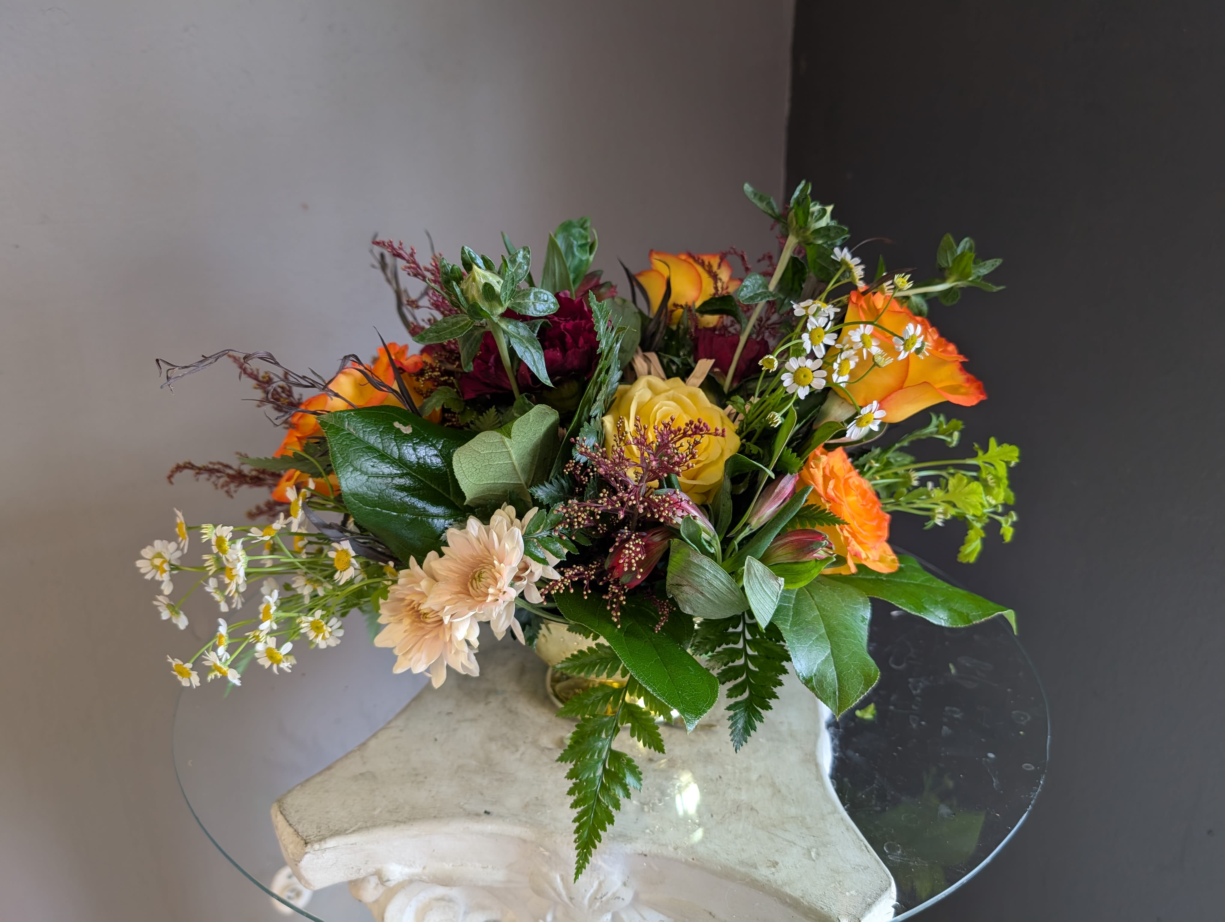 Holiday Centerpiece Table of 2 - Beautiful arrangement of fresh flowers displayed inside a cornocopia 
