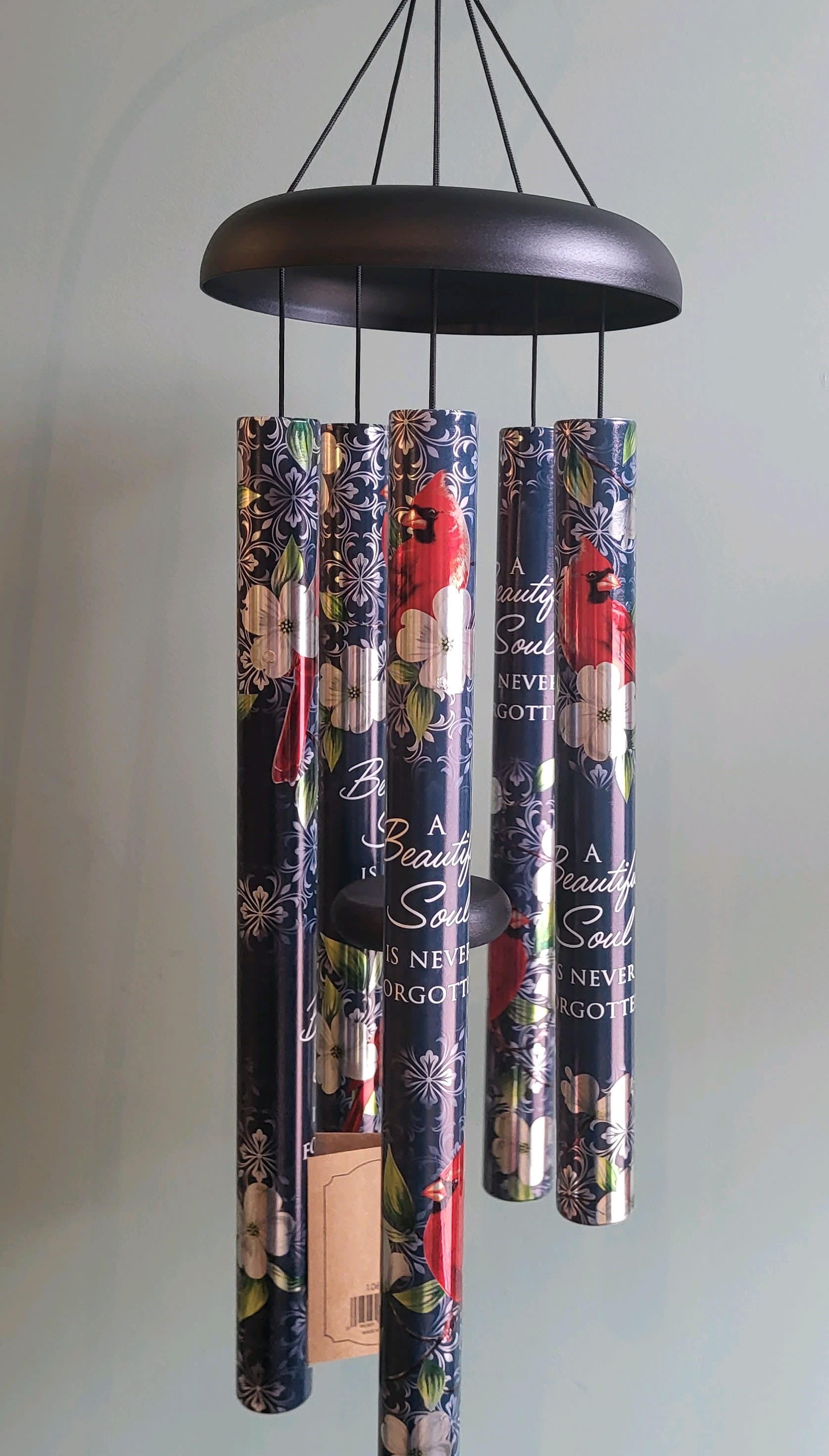 40" Wind Chime:  "Beautiful Soul"  DISPLAYED ON A STAND - A new 40" Sonnet Chime, "Beautiful Soul" reads "A beautiful soul is never forgotten" This beautiful deep blue tone UV printed chime has an adjustable striker and measures 40"L x 7 1/4"W (1 1/4" diameter tubes). Beautiful sound, striking red cardinals &amp; heartfelt sentiment highlight this incredible lasting sympathy gift.