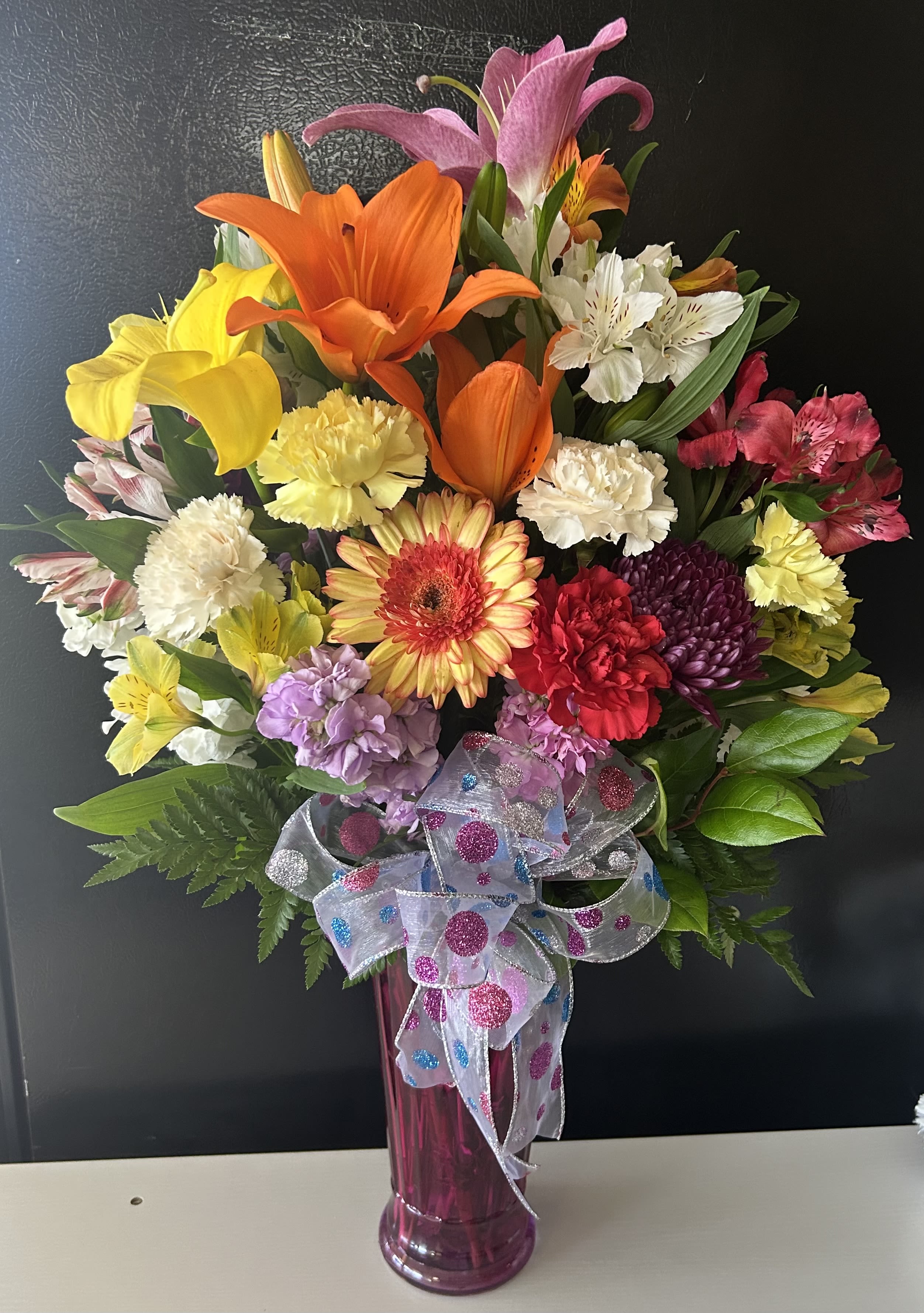Color my world  - fresh mix of flowers in long tall vase 