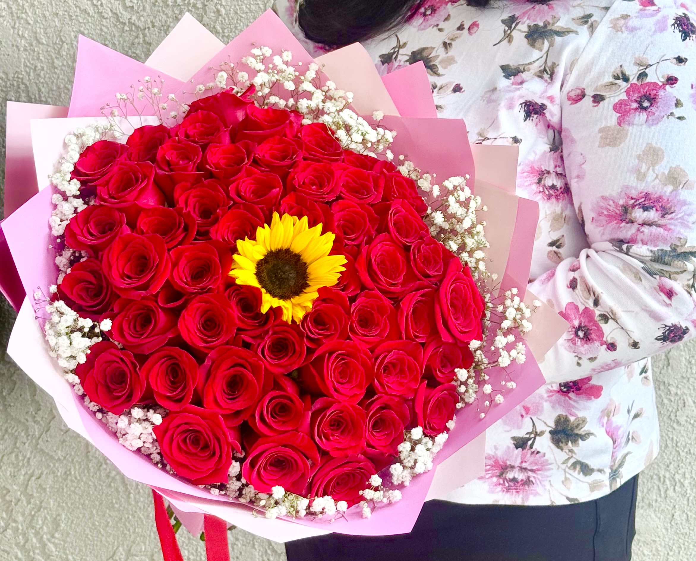 &quot;For my Special Person&quot;  50 Rose Bouquet  - Beautiful bouquet decorated with 50 red roses . It’s accented with a beautiful sunflower  Large size bouquet  Diameter is 18-20” Impress  someone special 