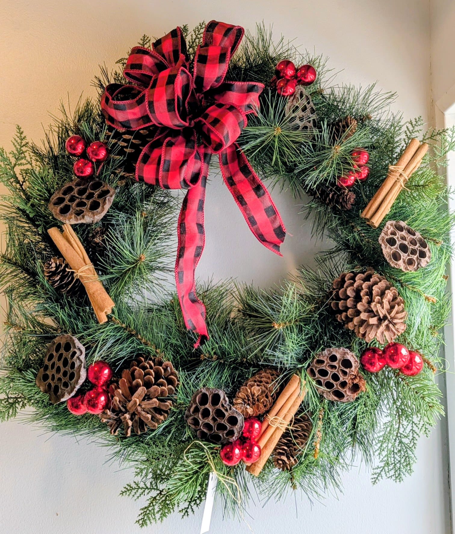 Cinnamon Spice Artificial Wreath 22&quot; with real Cinnamon - Artificial greens with real cinnamon.